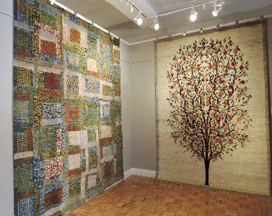 A Khotan-inspired design from Wool & Silk Rugs hand-knotted in Afghanistan (left) and a Luri wool Tree of Life design woven in Iran by Zollanvari are displayed gallery-style at Sarasota's Art to Walk On.