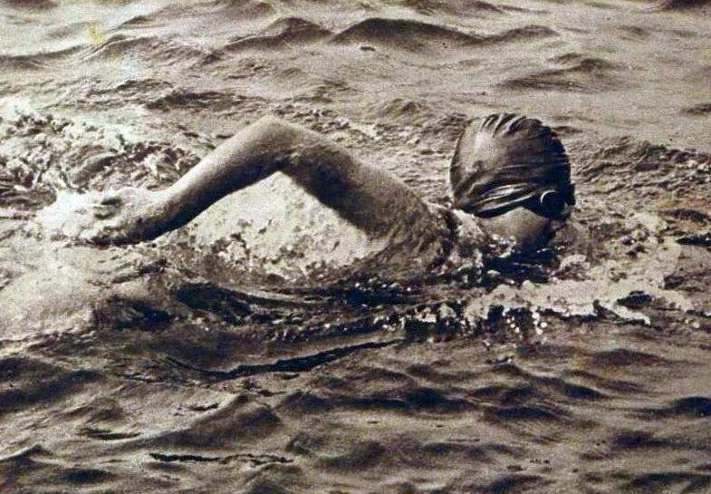 GERTRUDE EDERLE, QUEEN OF THE WAVES