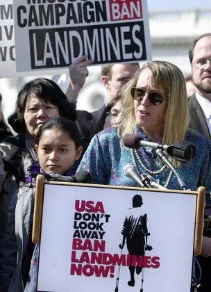 THE WOMAN IN THE MINEFIELDS