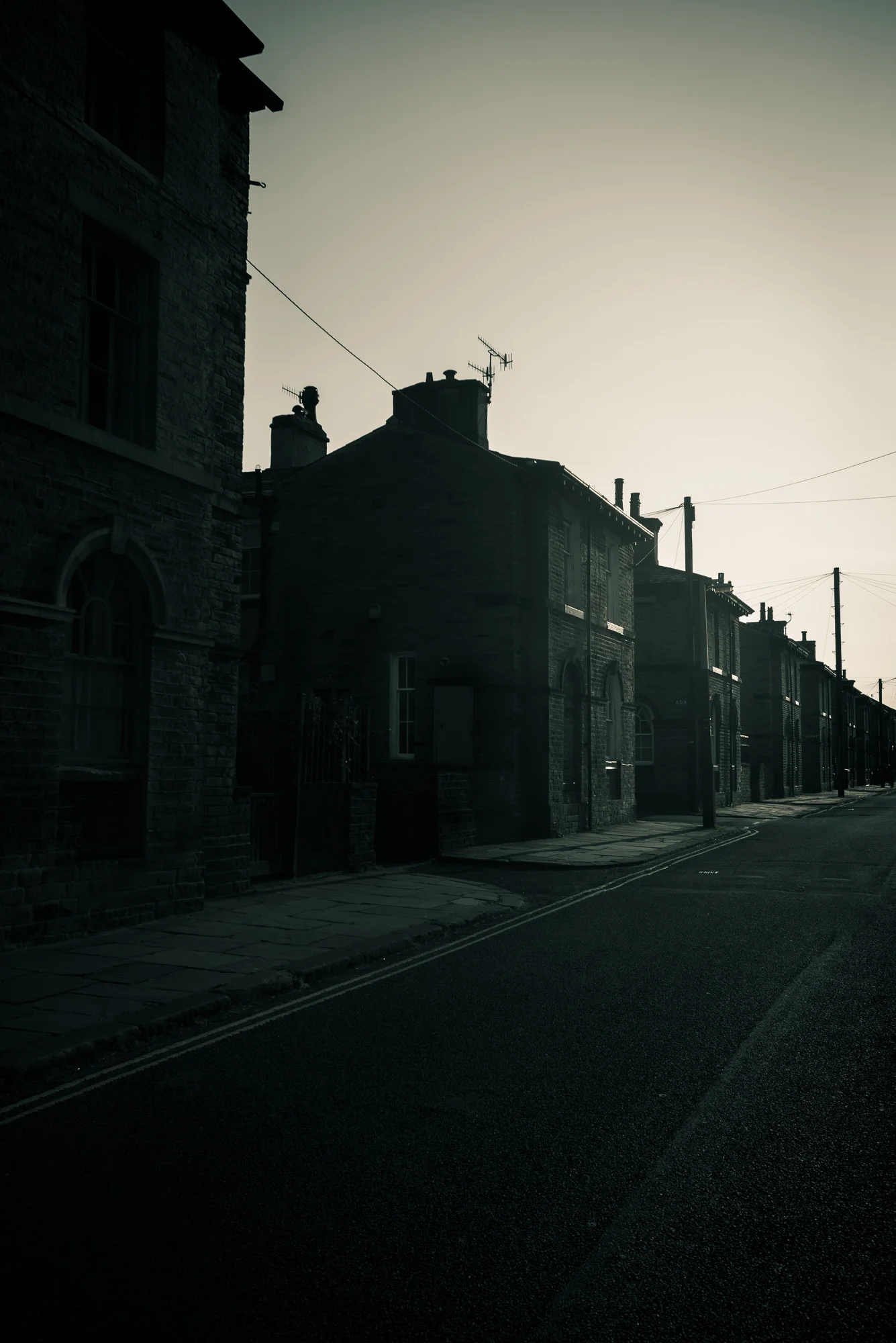 Saltaire street at dusk in monochrome