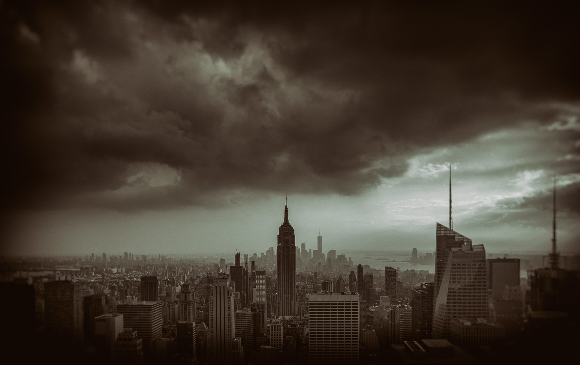 Dusk over Manhattan skyline with dramatic cloud