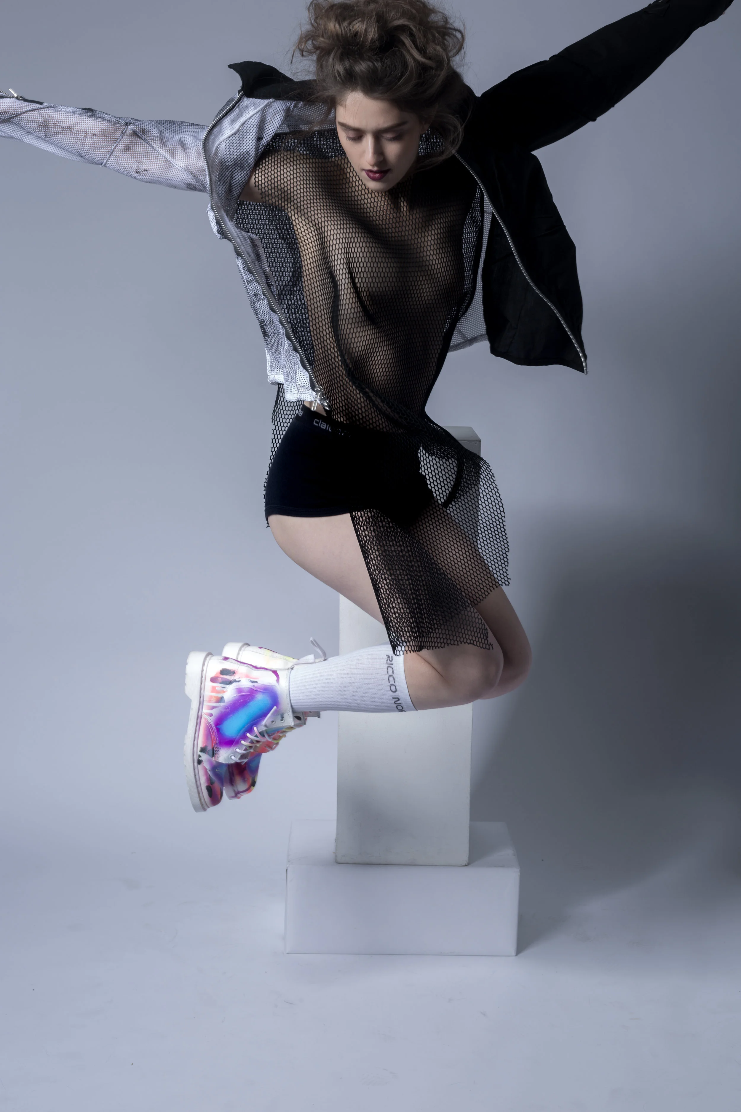 Keiko Koakutsu (jacket) Keiko Koakutsu (mesh top) Liz Claiborne (shorts) Ricco Noir (socks) Rochambeau (shoes) Makeup: Xiaofeng Zhu Hair: Lea Deloy Model: Inga Khurieva Photographer: Anushila Shaw 