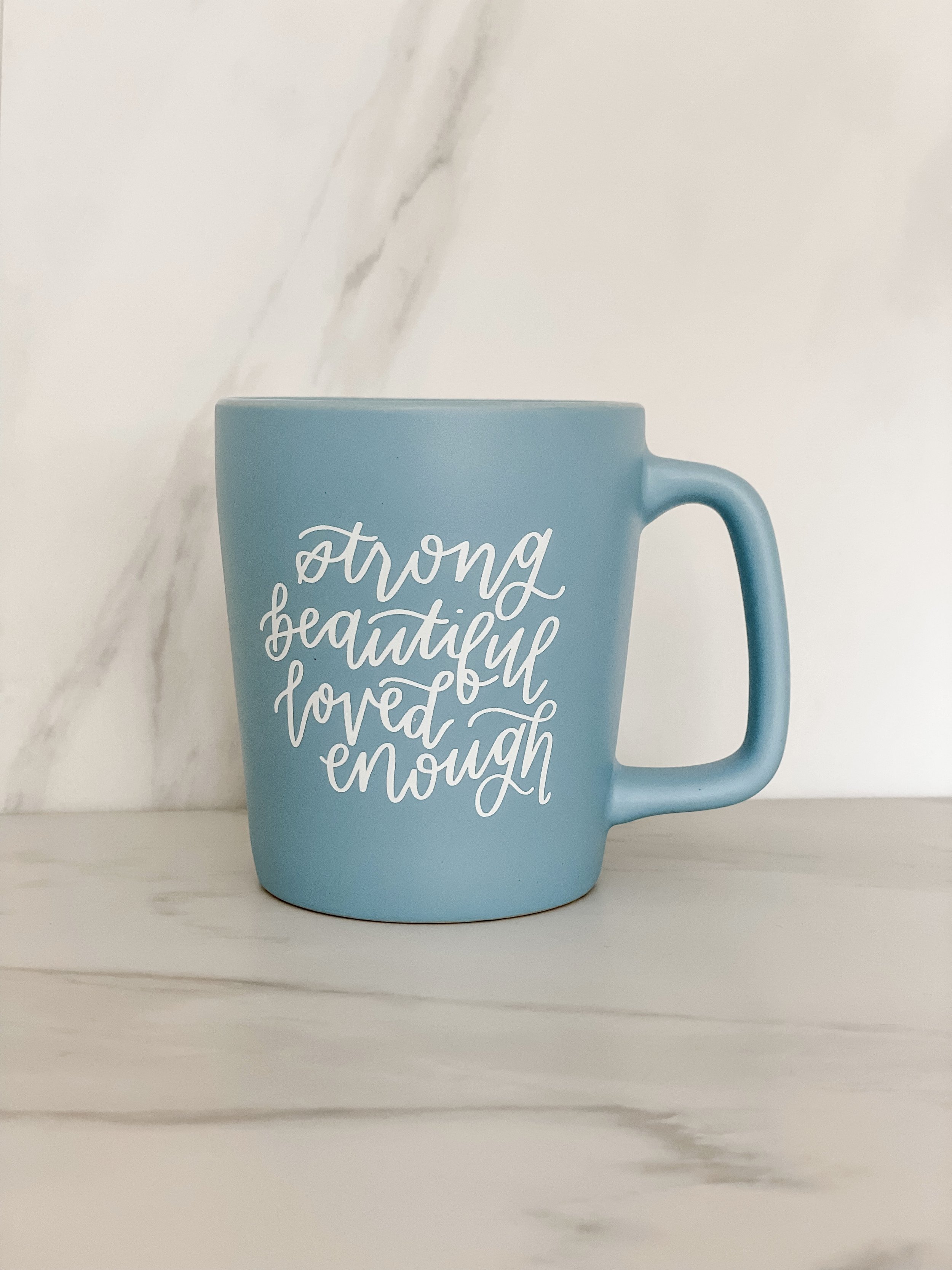 Strong beautiful loved enough light blue coffee mug Hero.jpg