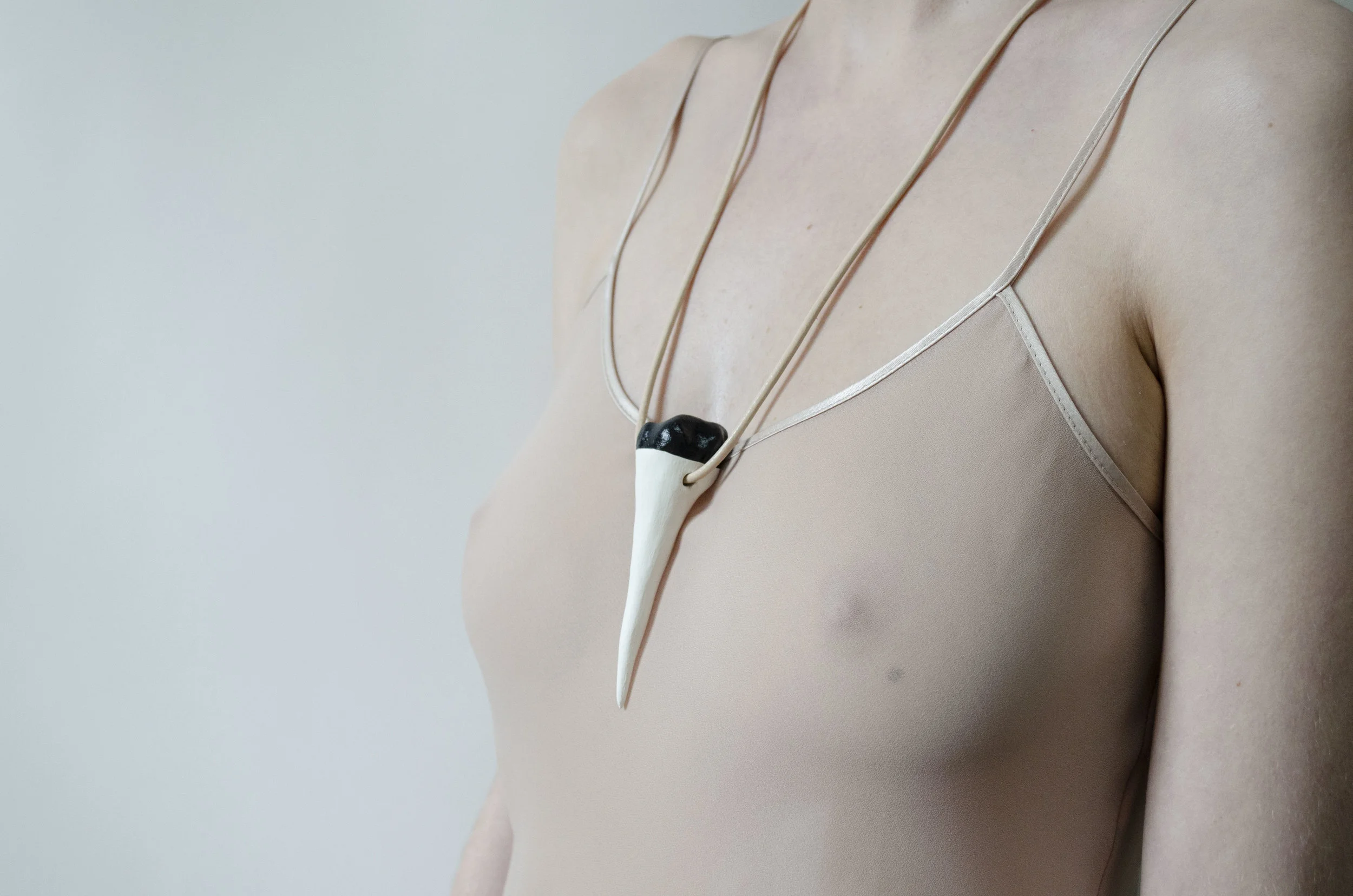 SINGLE ROOT TOOTH PENDANT (black and gold)