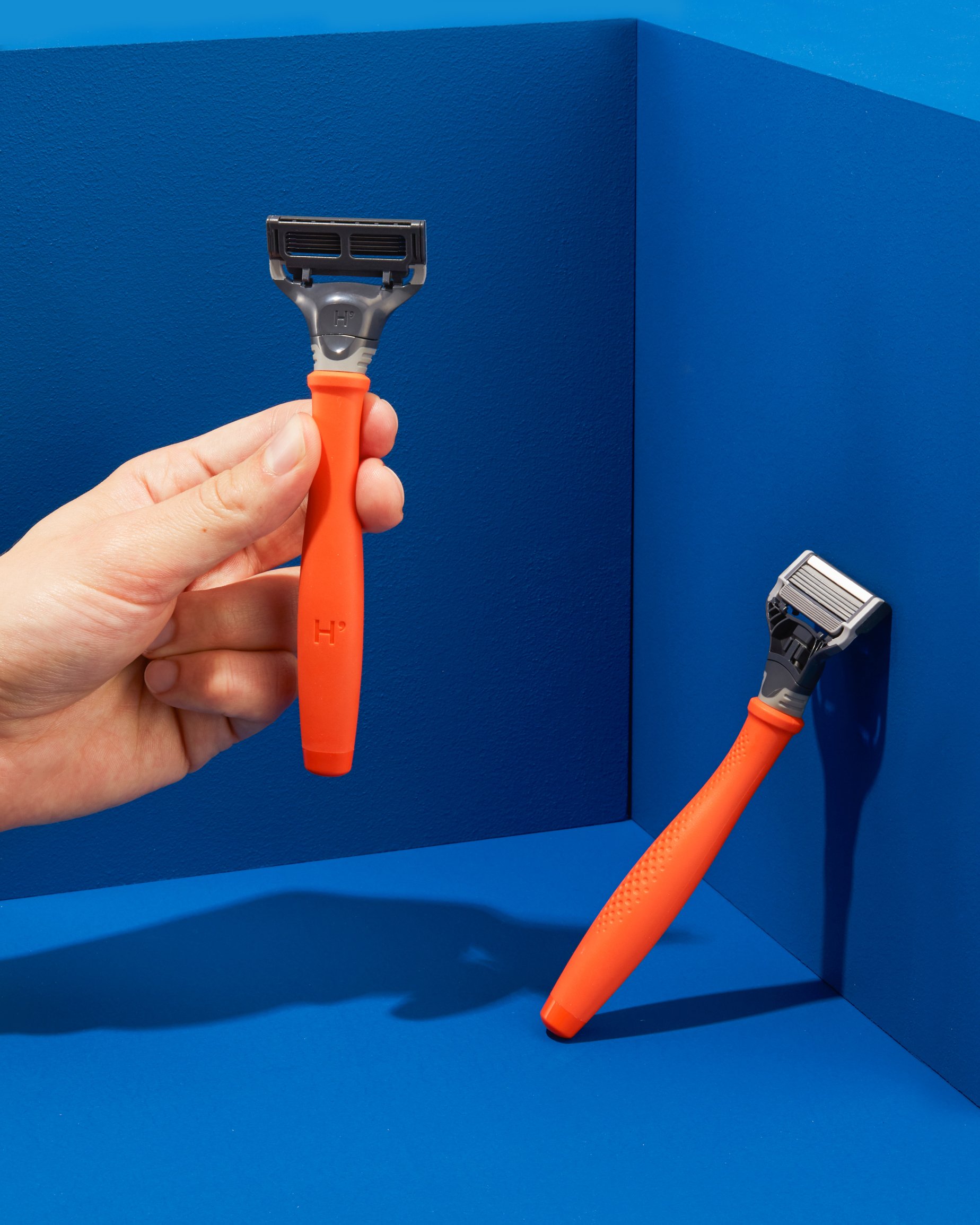 0002_Orange-truman-blue-plinth.jpg