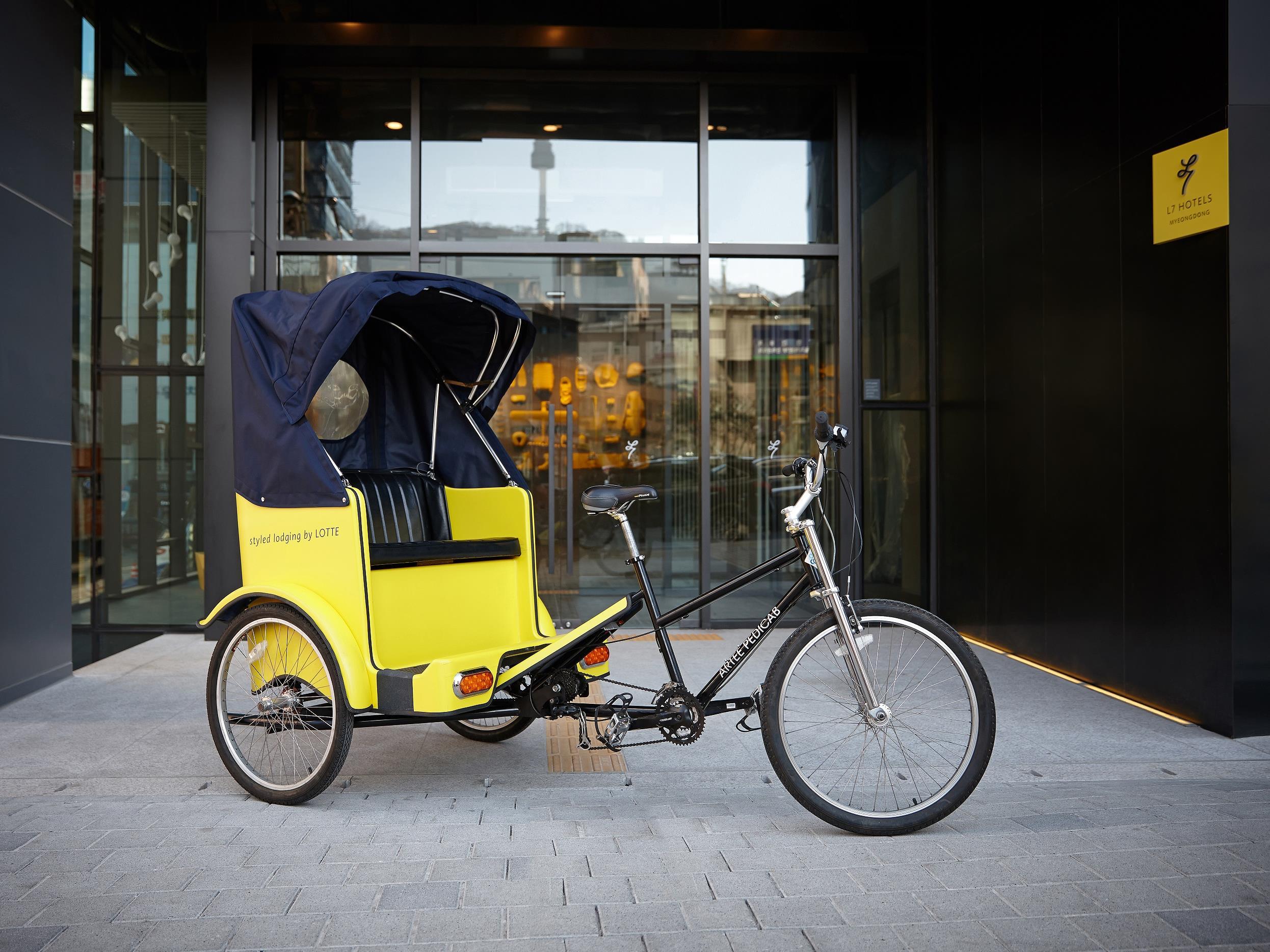 L7 offers rickshaw rides to get a tour of the city by a local - a collaboration with pedicab service ARTEE