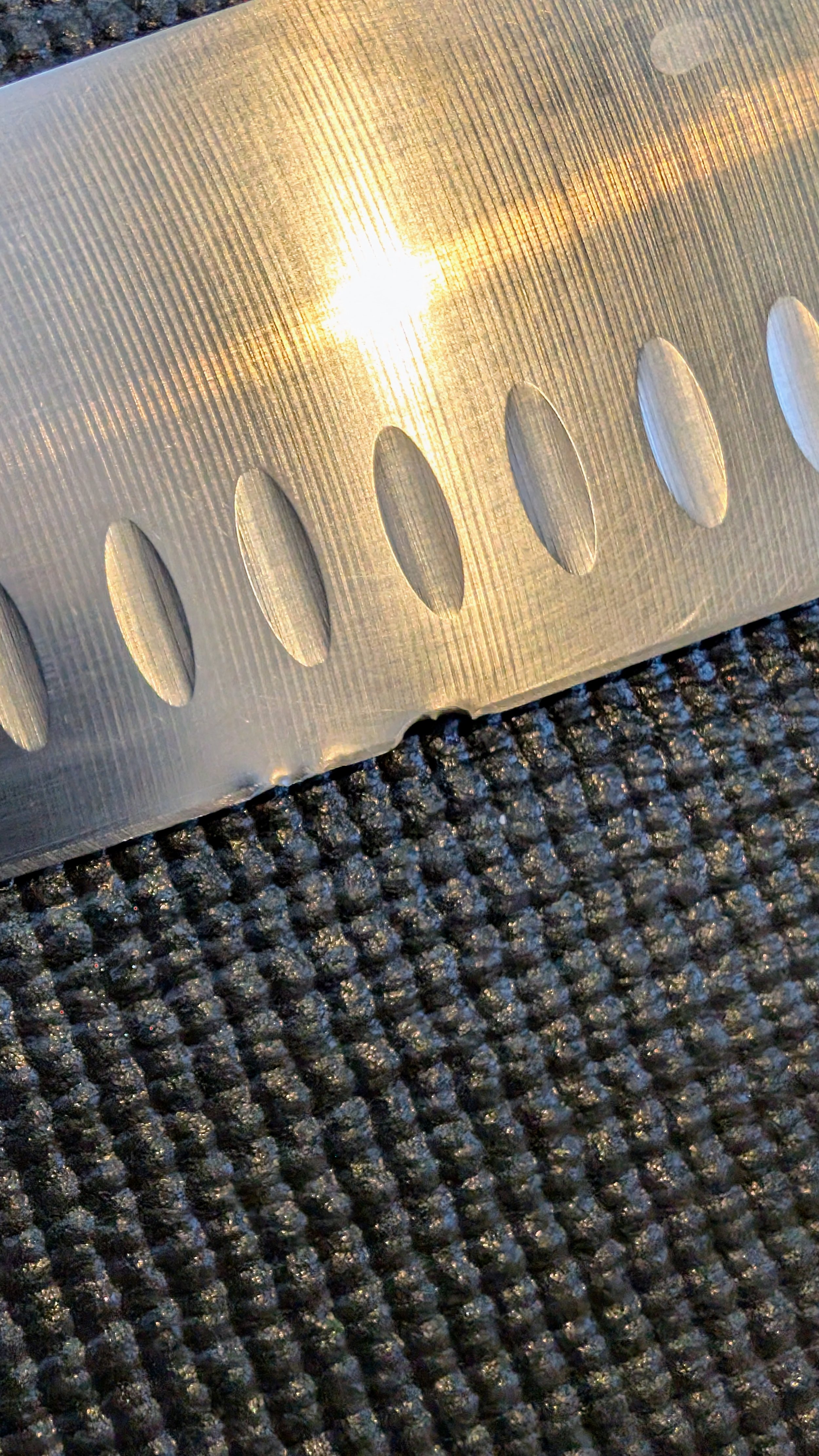 This Furi had a pretty nasty chip right in the best bit of the blade. Now all sorted with a gentle grind on the linisher and a new 15 degrees per side edge on the tormek T-8. Better than new.