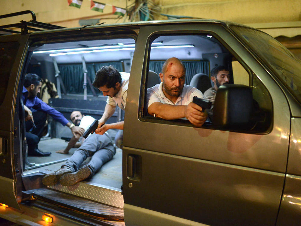 Door to Door: Lior Raz (Doron, front passenger seat) and fellow agents in Netflix’s Fauda