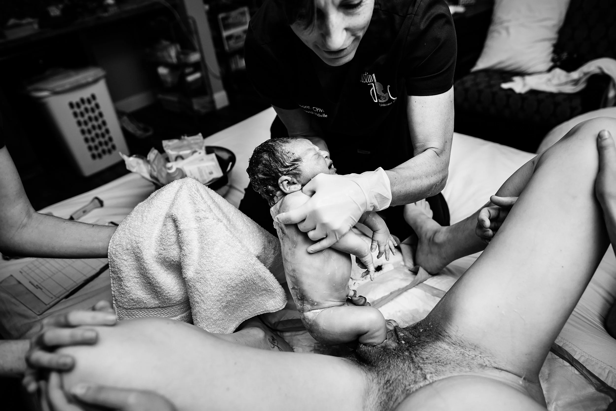 baby half born austin area birthing center.jpg