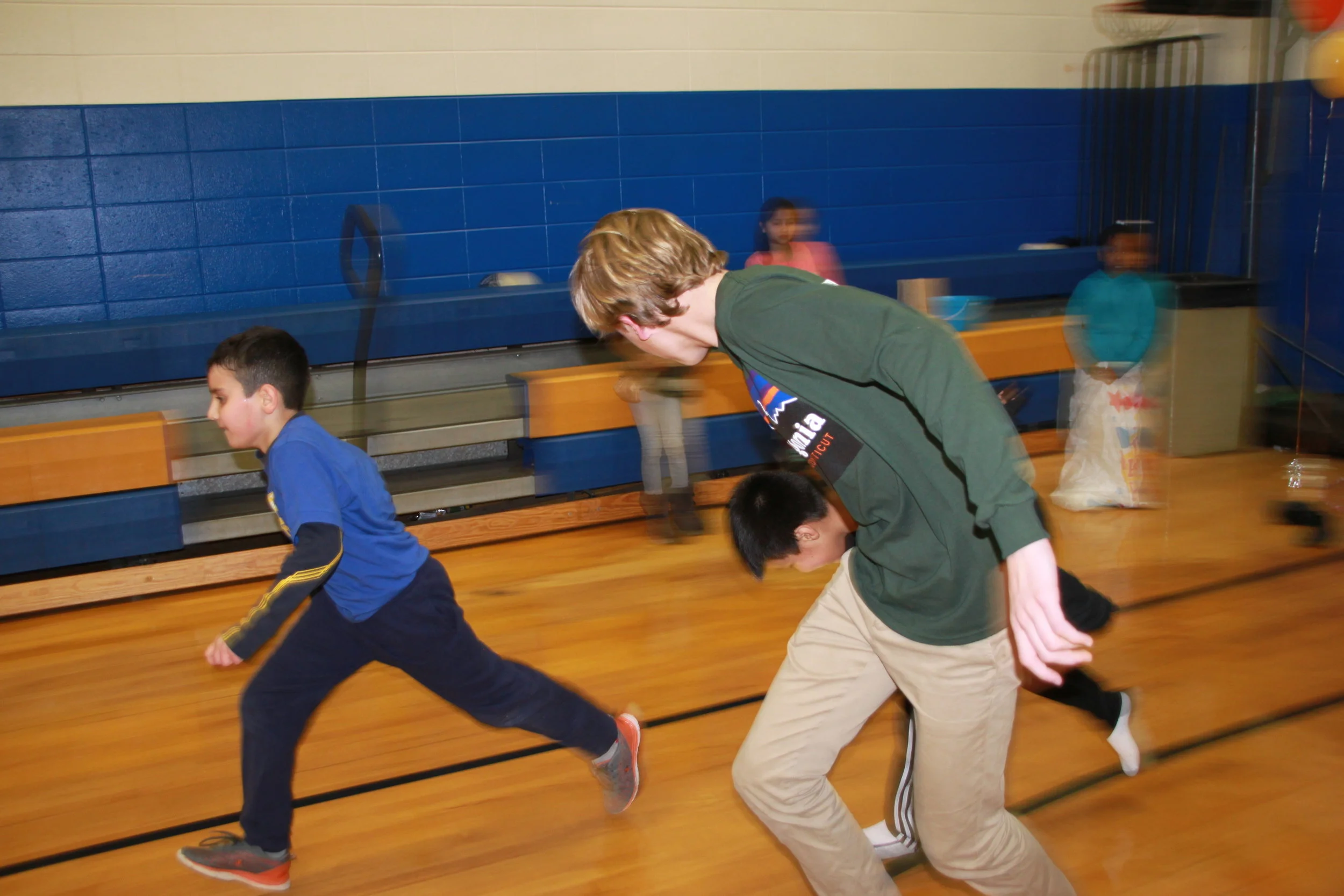 New Canaan High School Service League of Boys visits Carver