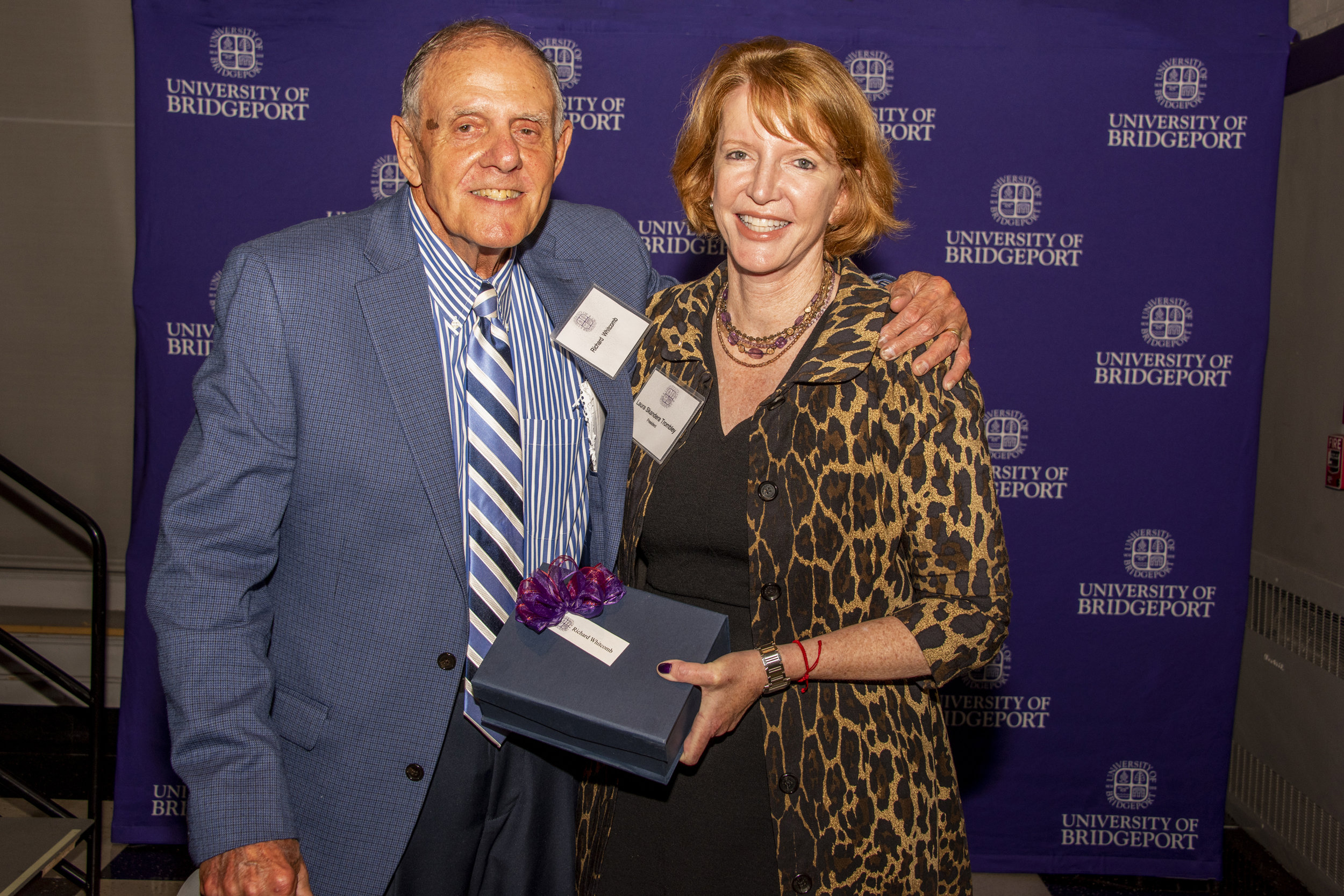 Dick Whitcomb and President Laura Skandera Trombley receiving award 2.jpg