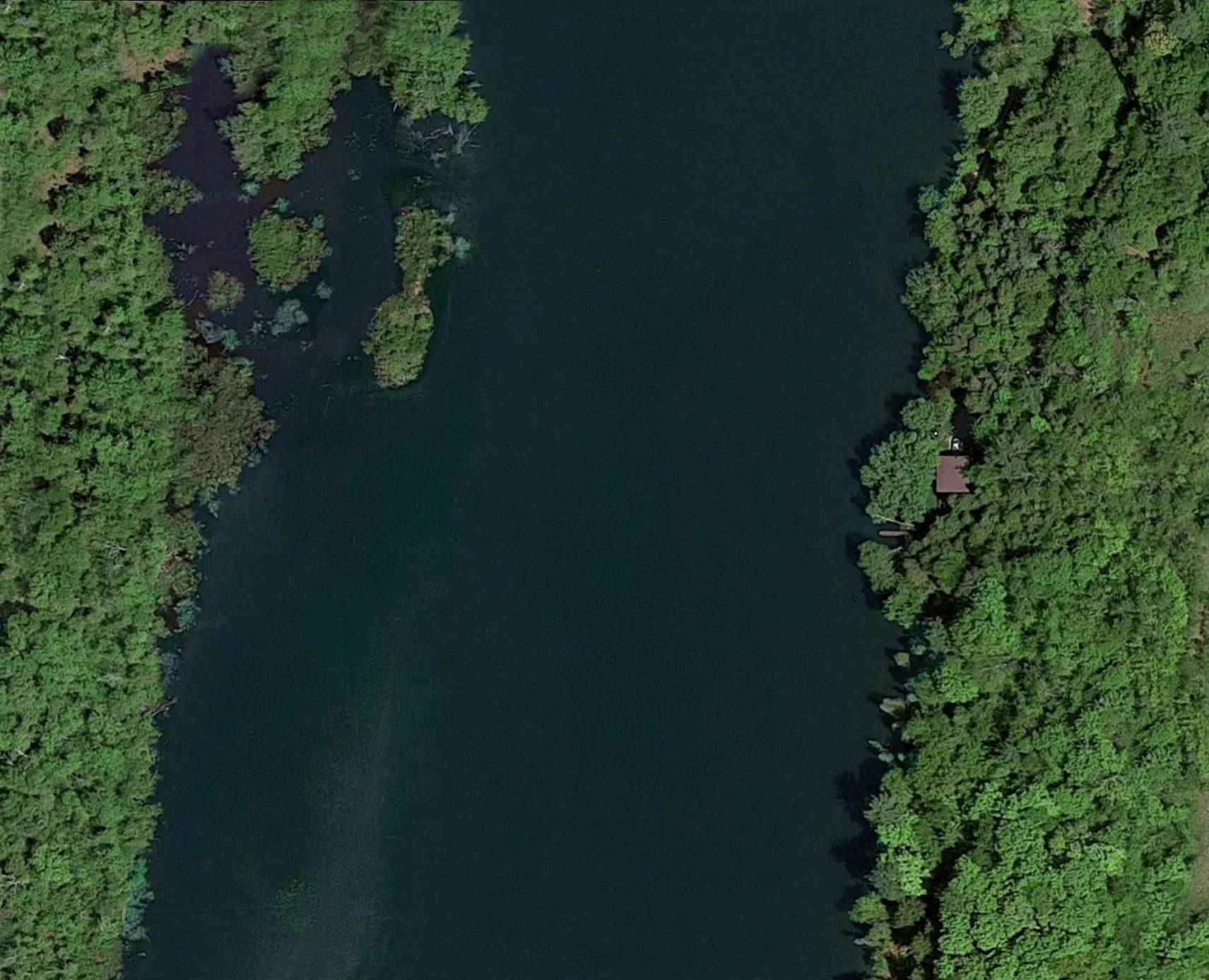 Spot the cottage on the right-hand shore—no neighbours on either side, or even across the river!