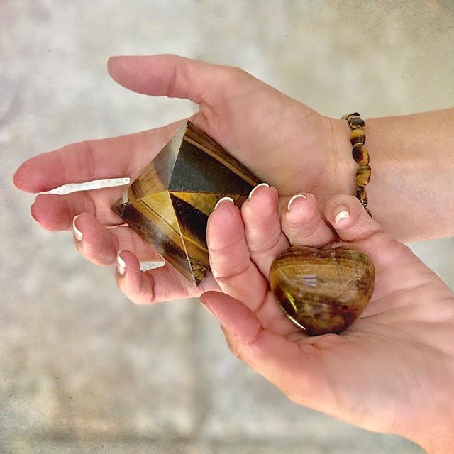 Tiger [Tiger's] eye is a chatoyant [having a changeable luster or color caused by aligned inclusions] member of the quartz family.  Revered as mystical for thousands of years, the stone was carved into amulets and talismans worn by ancient Roman sold