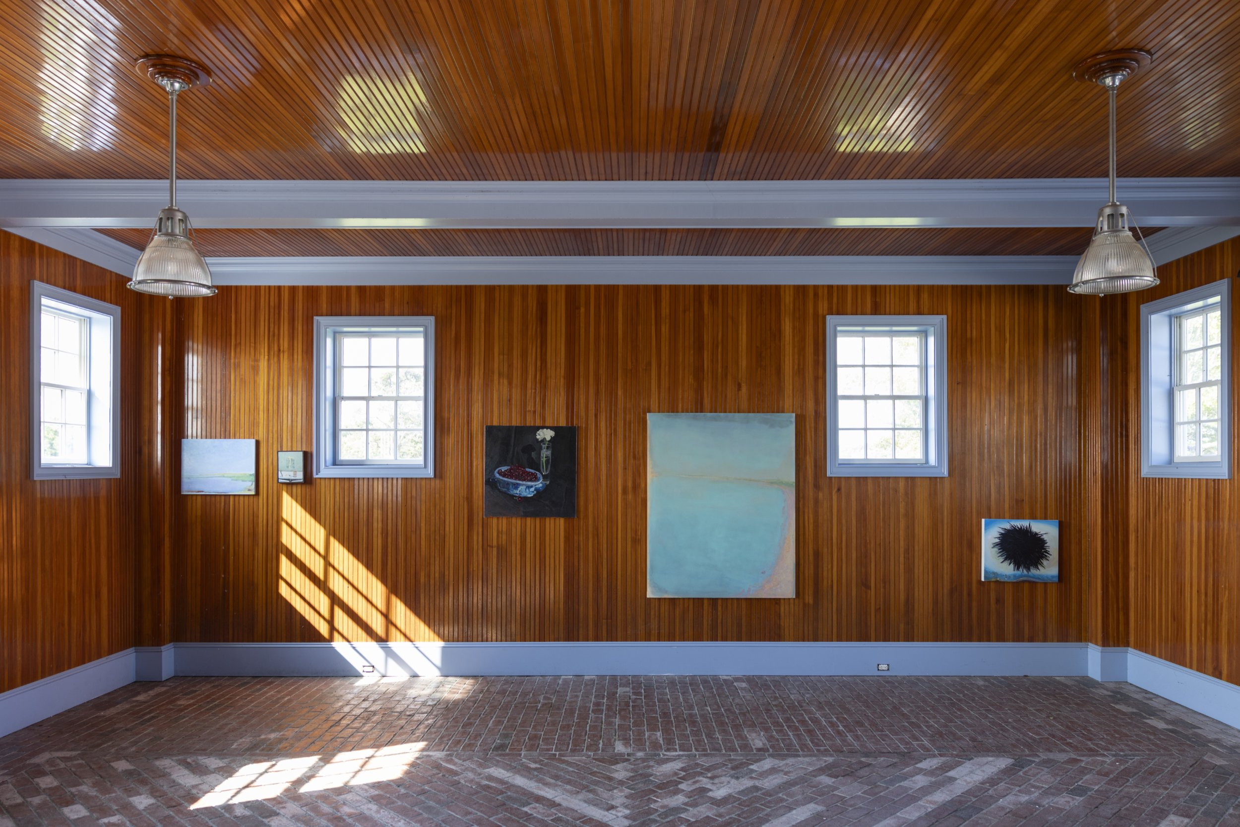Installation View HORIZONS curated by Ingrid Lundgren of Slip House, NY. August 2026 
far left: Dikes Bridge 18x24" oil on panel 
center right: Whelks, Cape Poge 60x48" oil on canvas