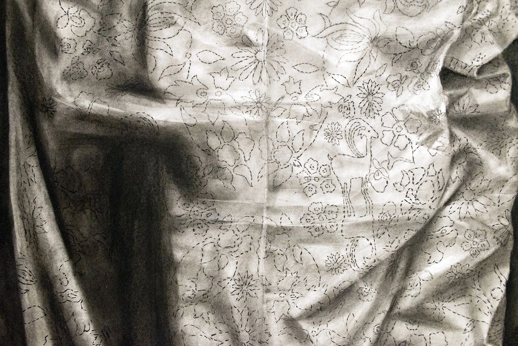 "Jesse the seguimos extrañando, tu mama y tus hermanos" Charcoal on Paper 6ft x 3 ft, 2015
