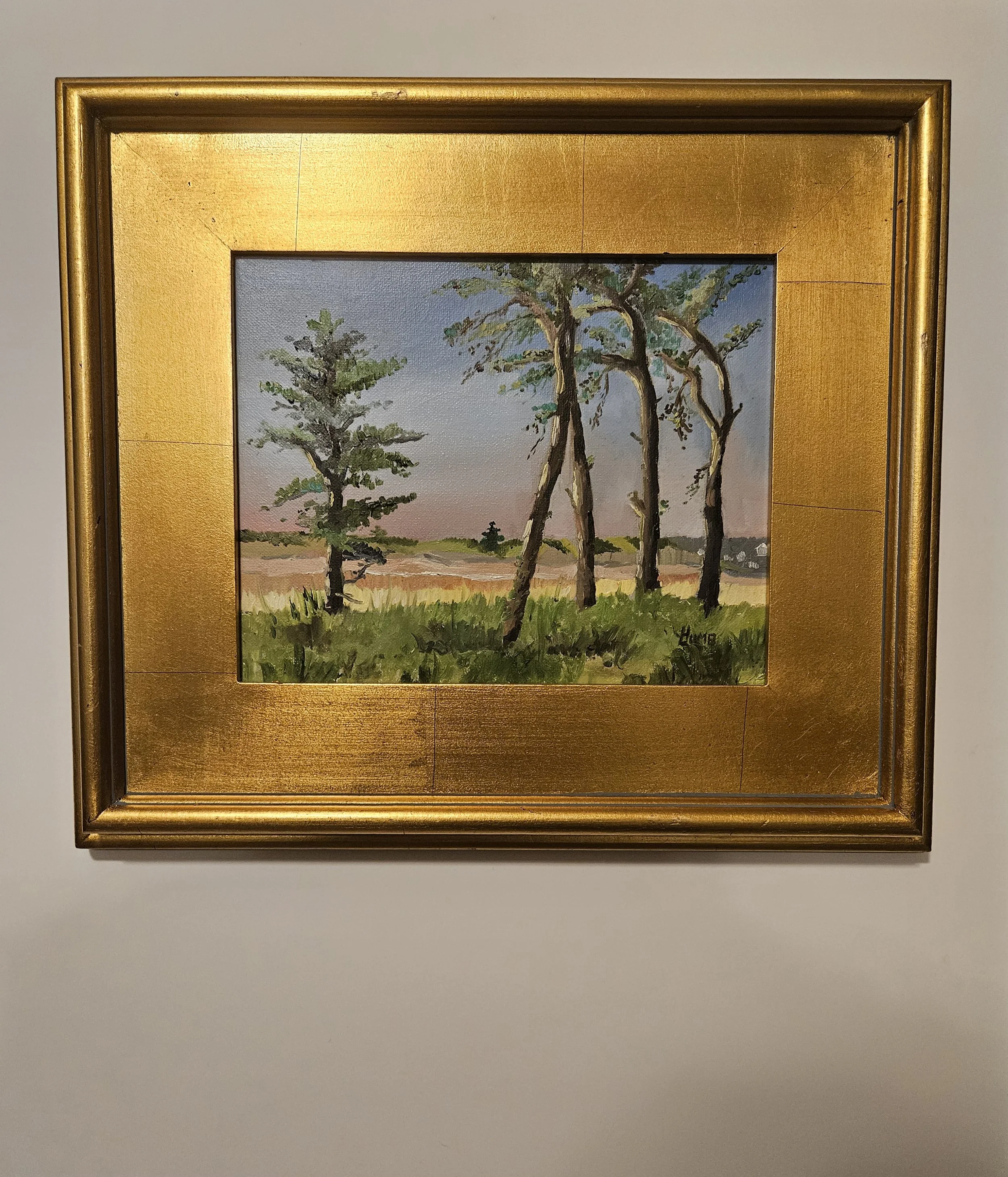 Gold leaf framed painting of beach dunes and trees at sunrise. Painted by Heather Lumb.