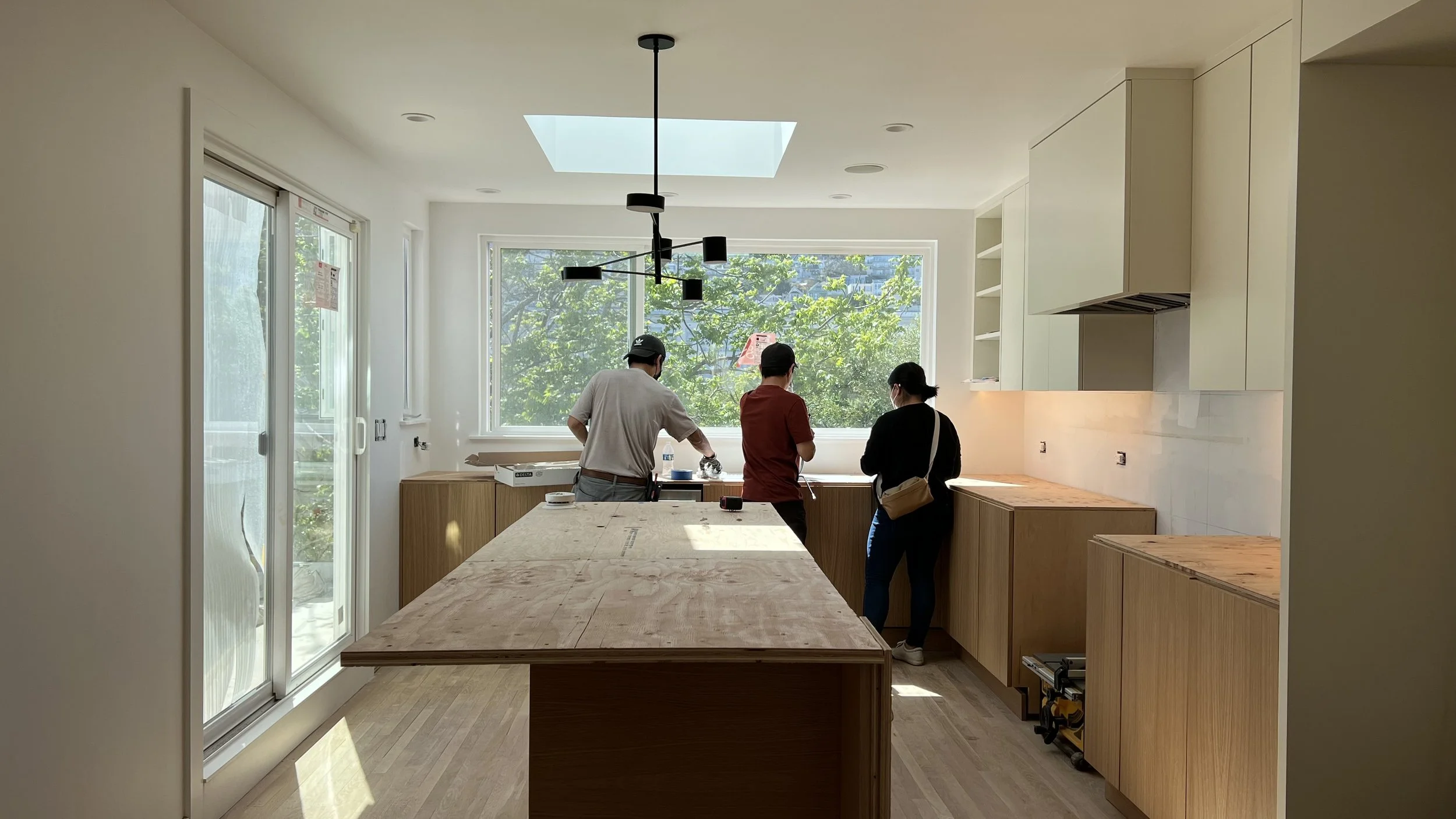  Team huddle to finalize details before tomorrow’s countertop templating… 
