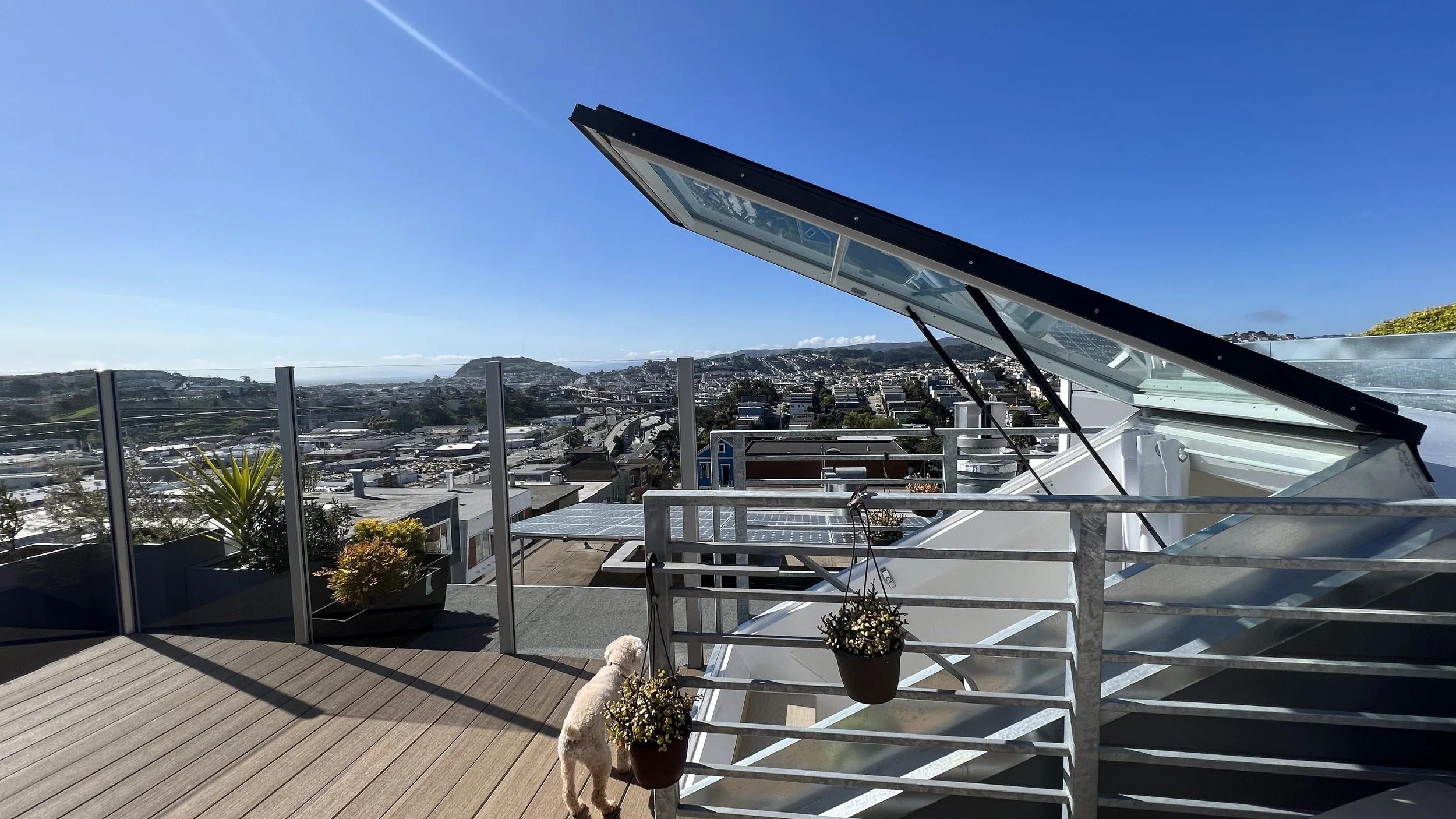  We unlocked the outdoors for our clients with this new serene rooftop deck with panoramic views. No detail was too small as we designed a windscreen to promote use throughout the year and the light low maintenance composite deck flooring seamlessly 