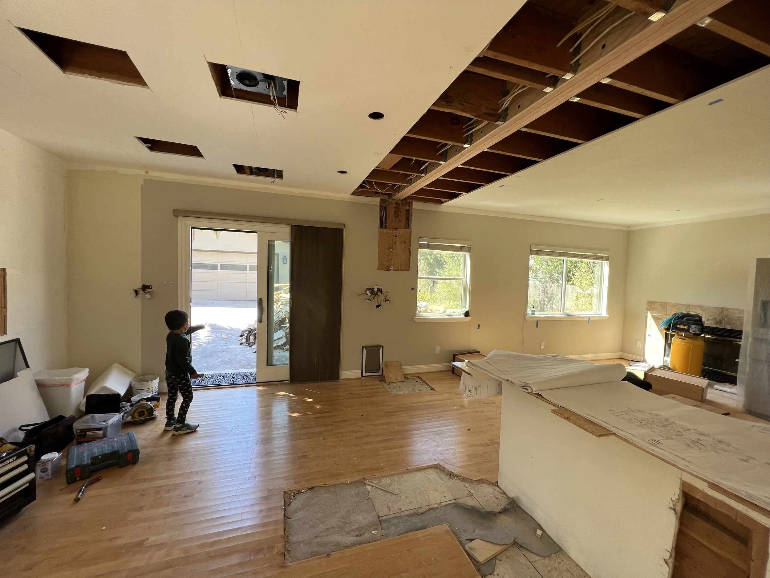  Our junior field inspector just signed off on our new LVL  flush  beam to now visually unite the Kitchen &amp; Family Room. 