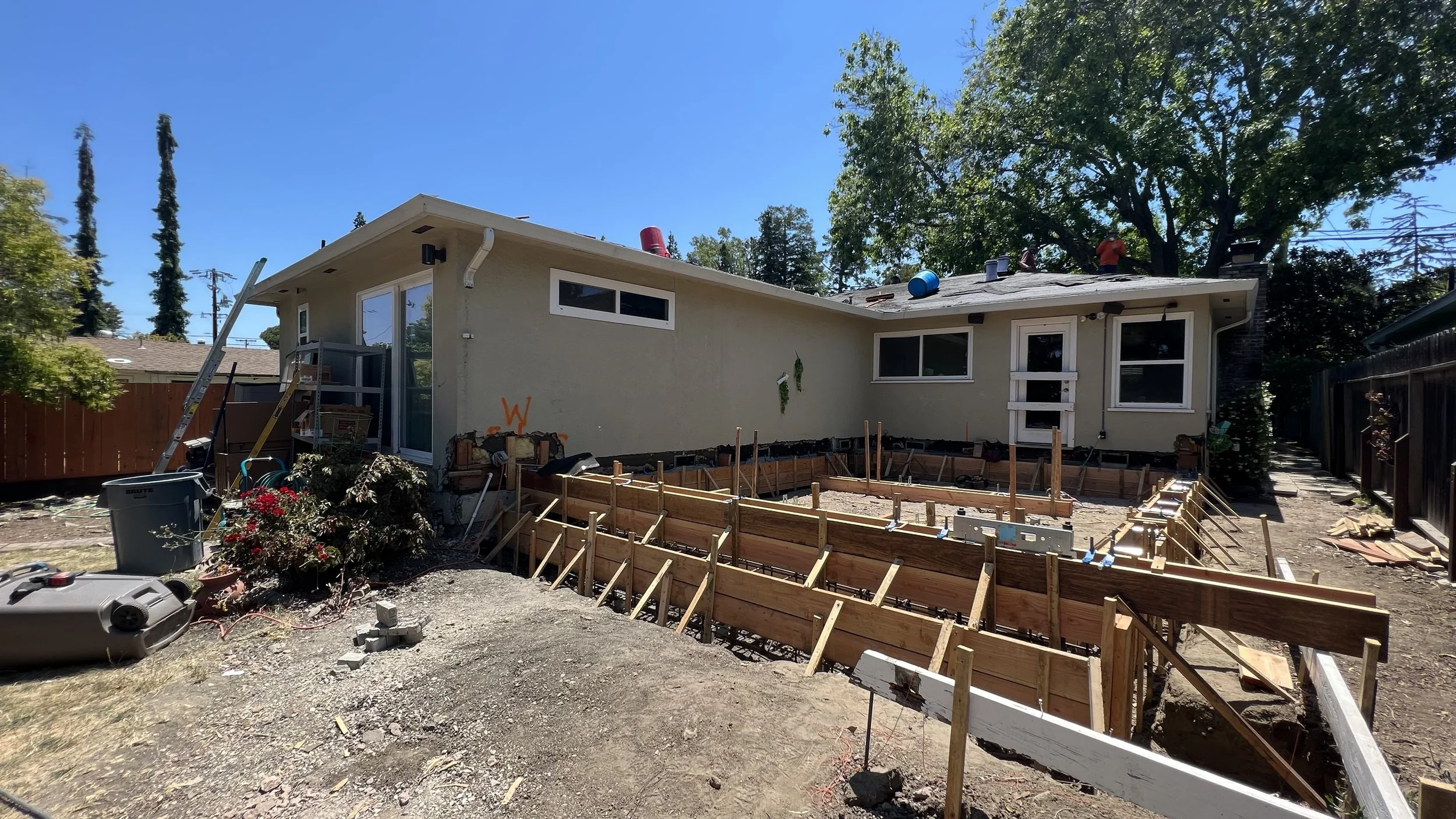  Foundation work is underway.  Through strategic planning with the contractor, the homeowners were able to remain in the house during the initial month of construction which was focused on the new addition. This meant one month of rental savings whic