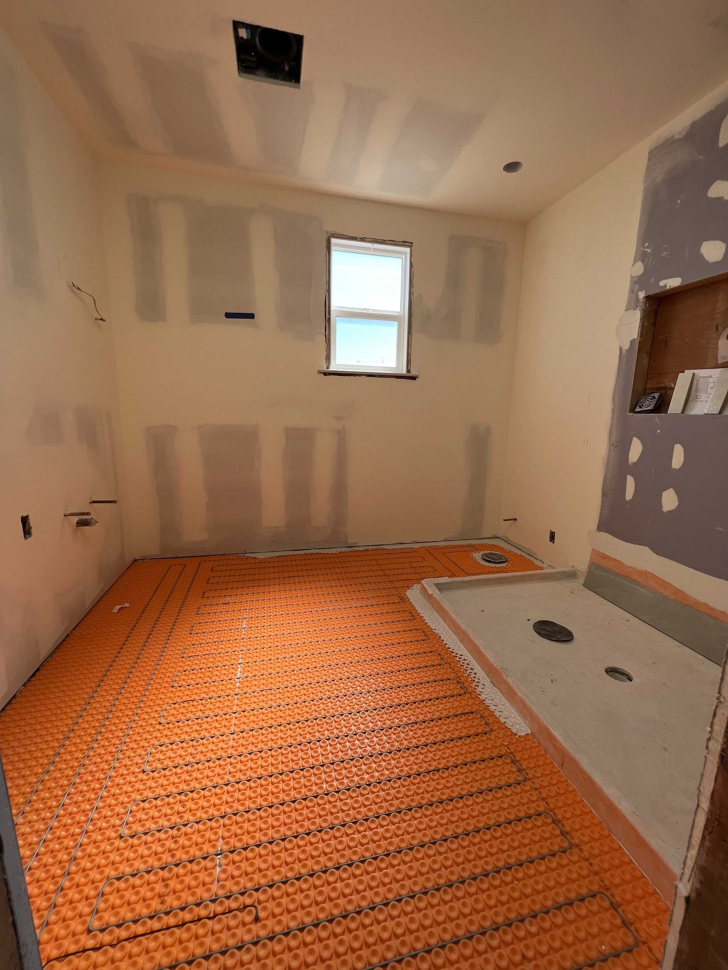  Underfloor heating membrane &amp; heating cables are in. 