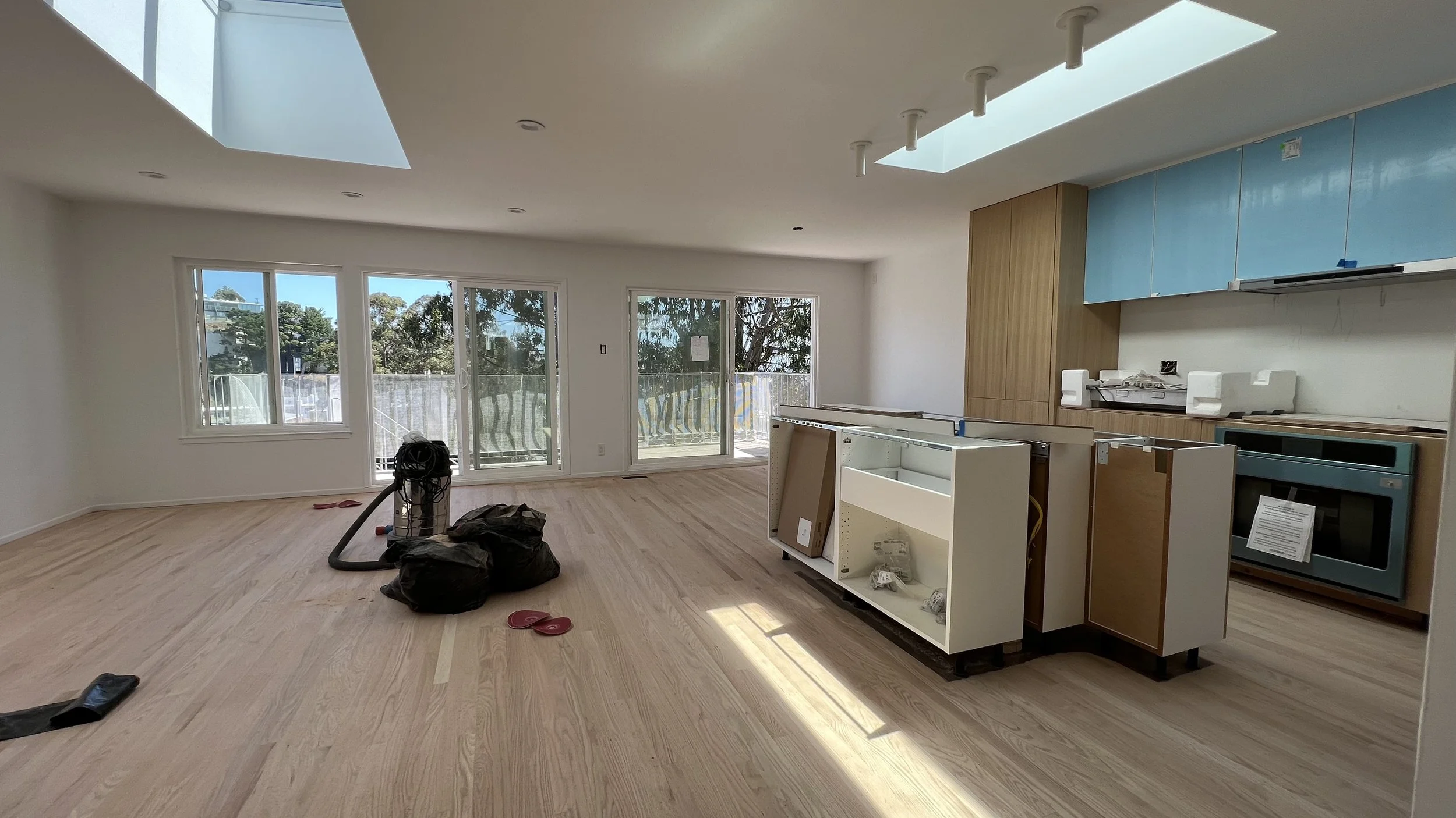  New hardwood floor sanding is underway… 