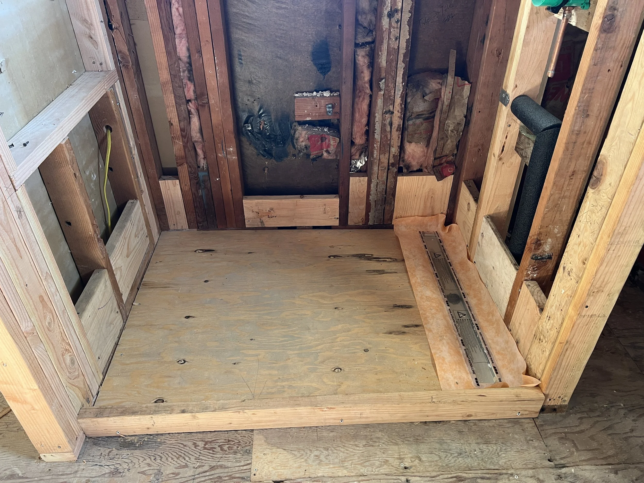  In progress linear drain waterproofing. 