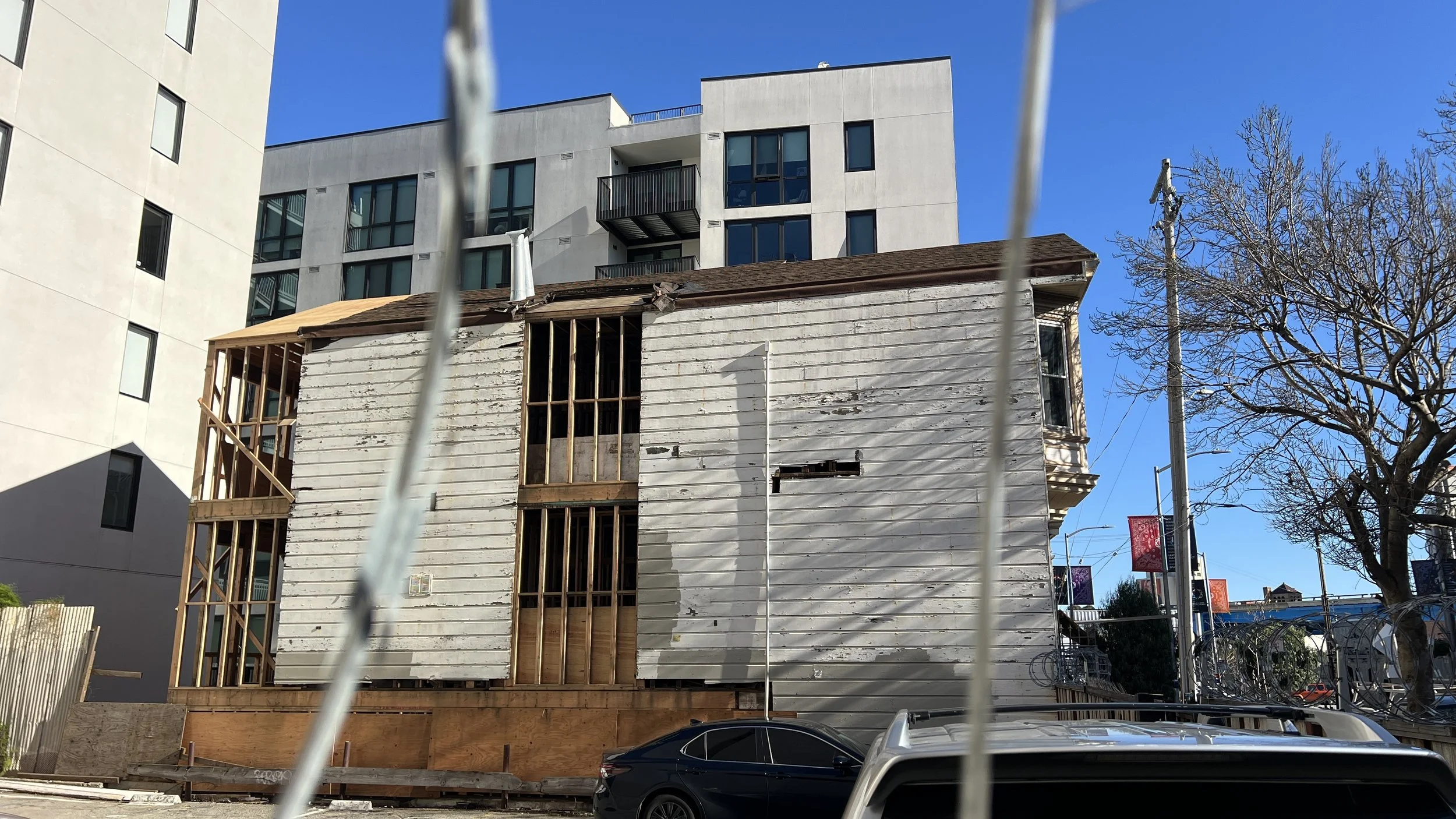 Framing for the second & third floor lightwell infill and rear additions is complete.