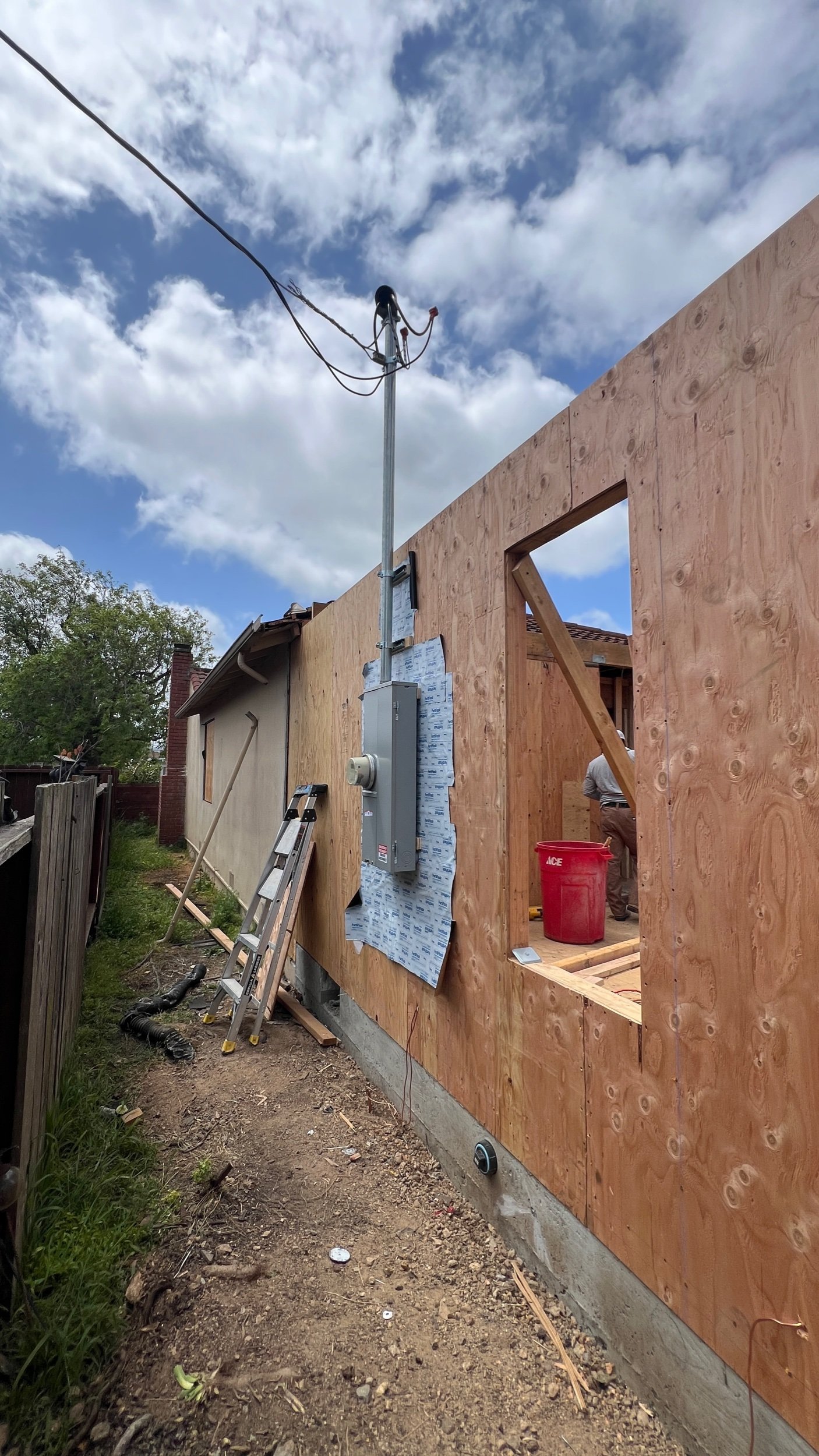 Strategically placing our new upgraded electrical meter where it is within the proximity of the previous meter. In doing so, we can avoid the need to bring in PG&E who are notorious for being challenging to deal with - if you can even get in tou