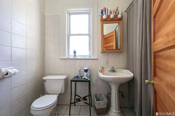 | Existing Typical Apartment Bath |