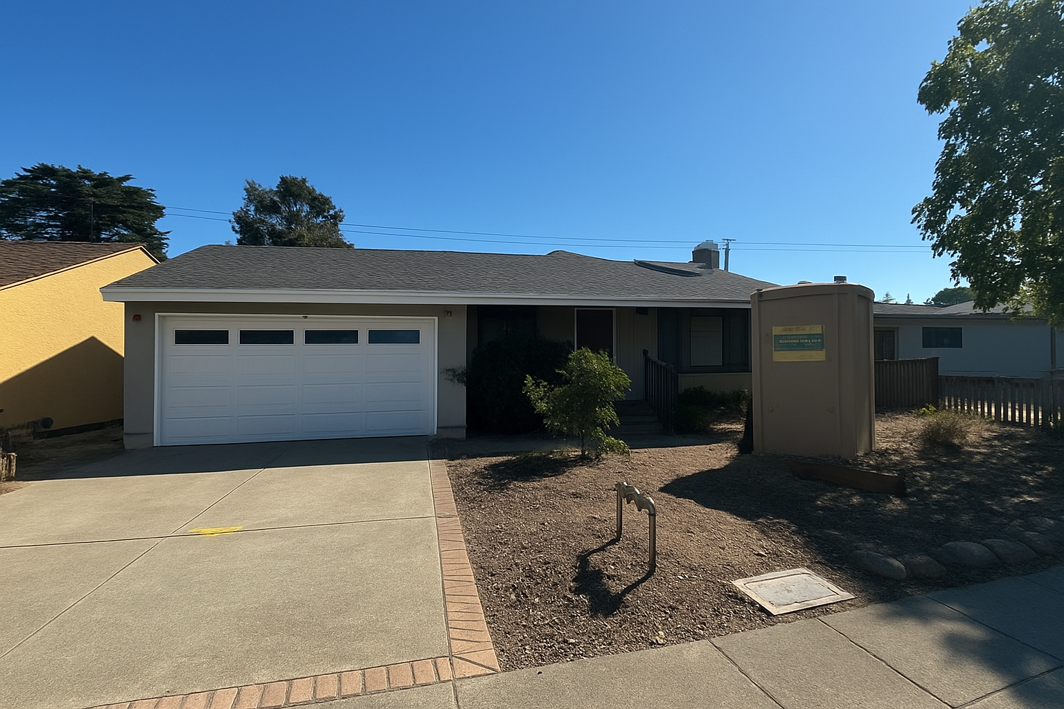 Checking in on the painting progress at the front of the house. A key to modernizing the house was replacing the metal roof with new asphalt shingles.
