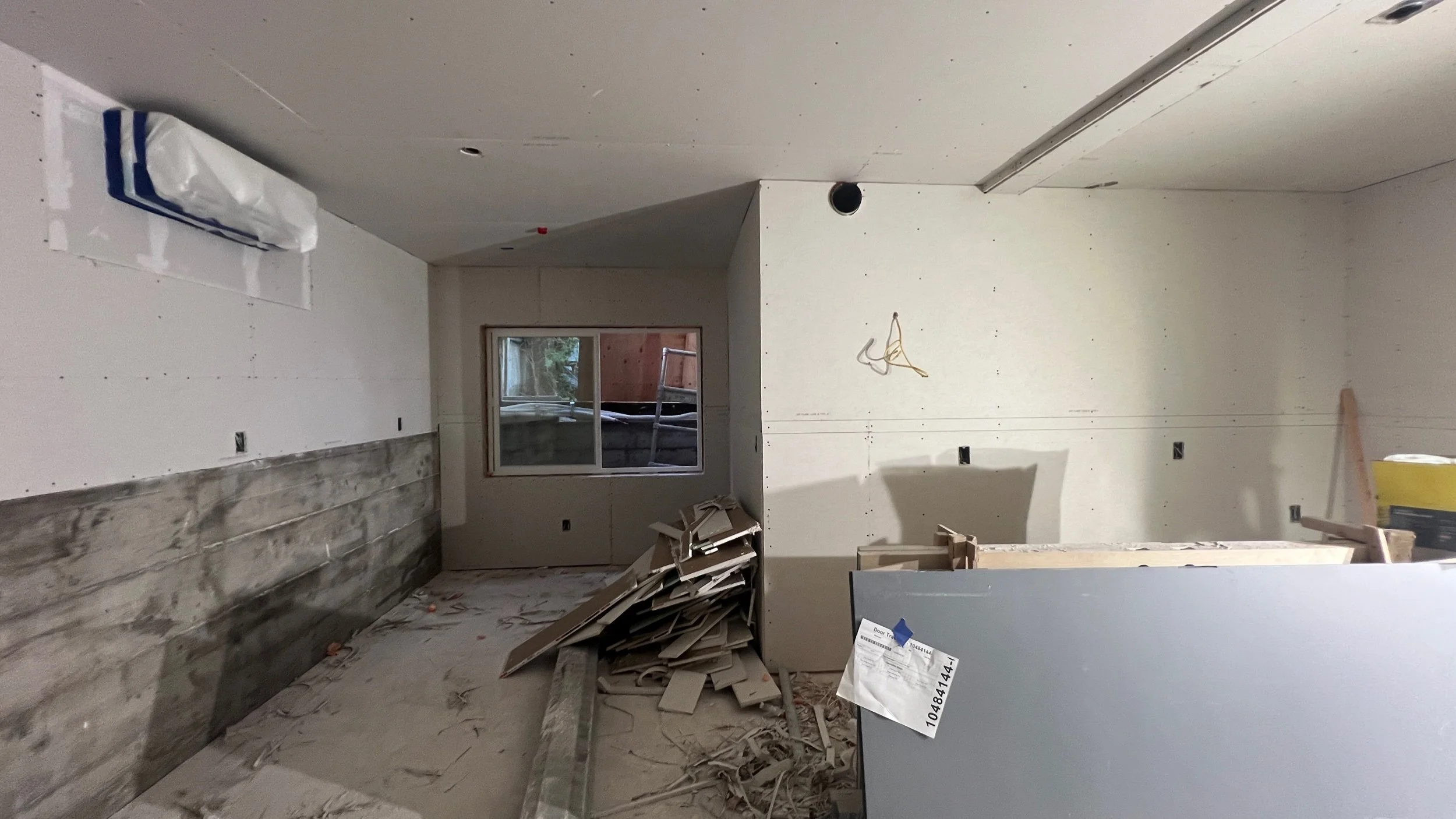 Small but mighty… One of the two Studio spaces are coming into view with the drywall installed…