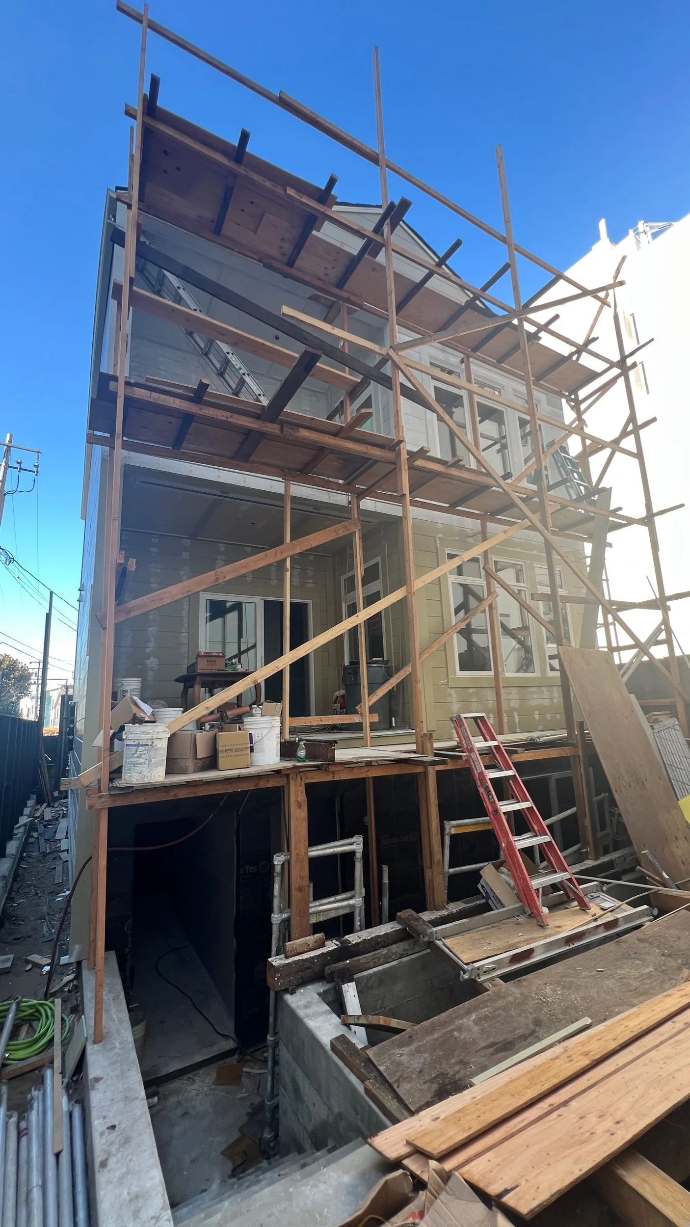 Rear face is coming into view with new siding windows, & trim.