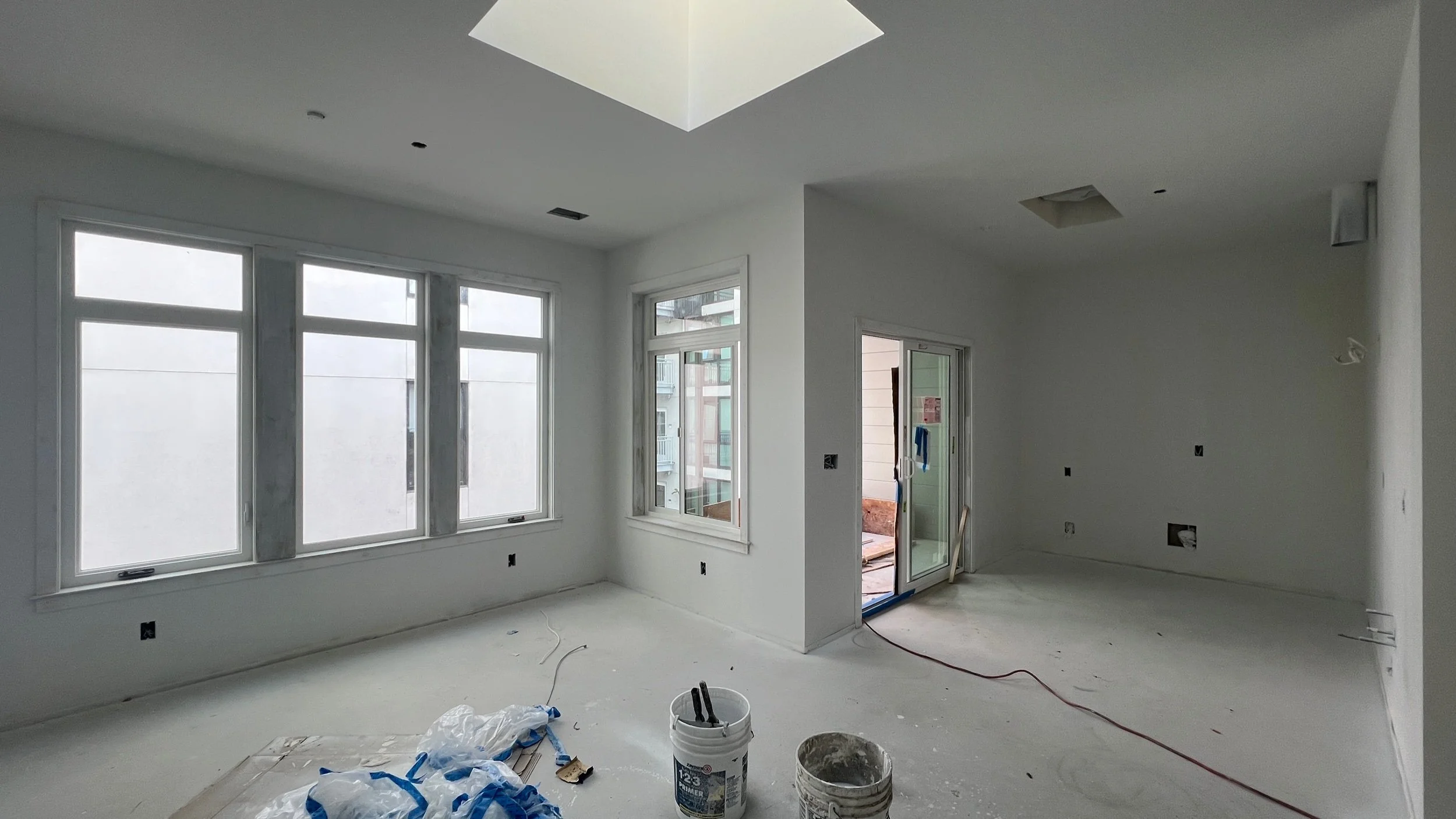 With the drywall up & primed, you can get a great feel for the new top floor —open, bright, and full of potential!  After 10-days, the gypcrete topping is now fully cured & ready for our finish flooring. Cure time is dependent on the thickne