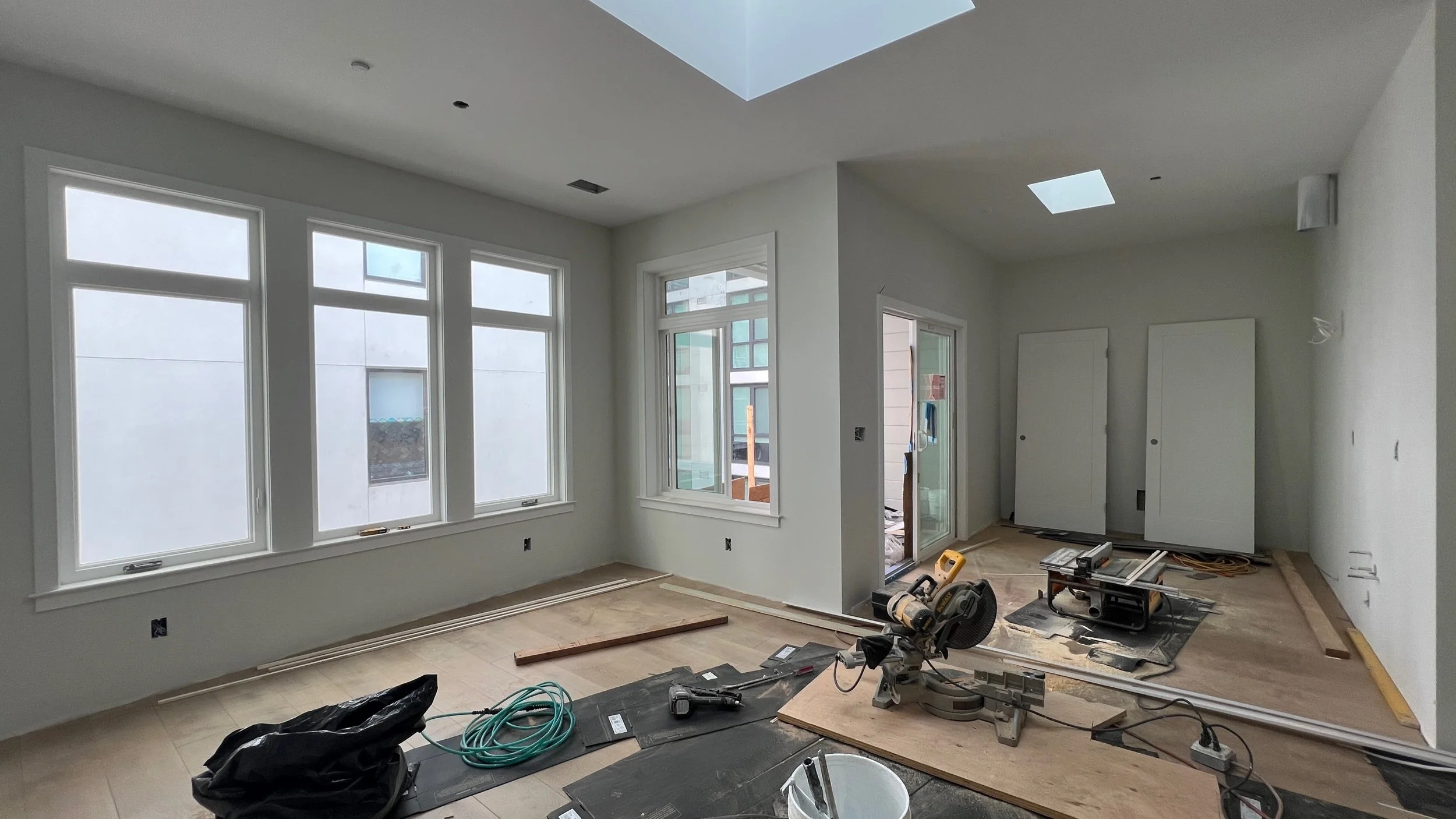 The flooring is going down with the perfect apartment rated waterproof & wet mop friendly laminate floor - with all the beautify of a hardwood floor.