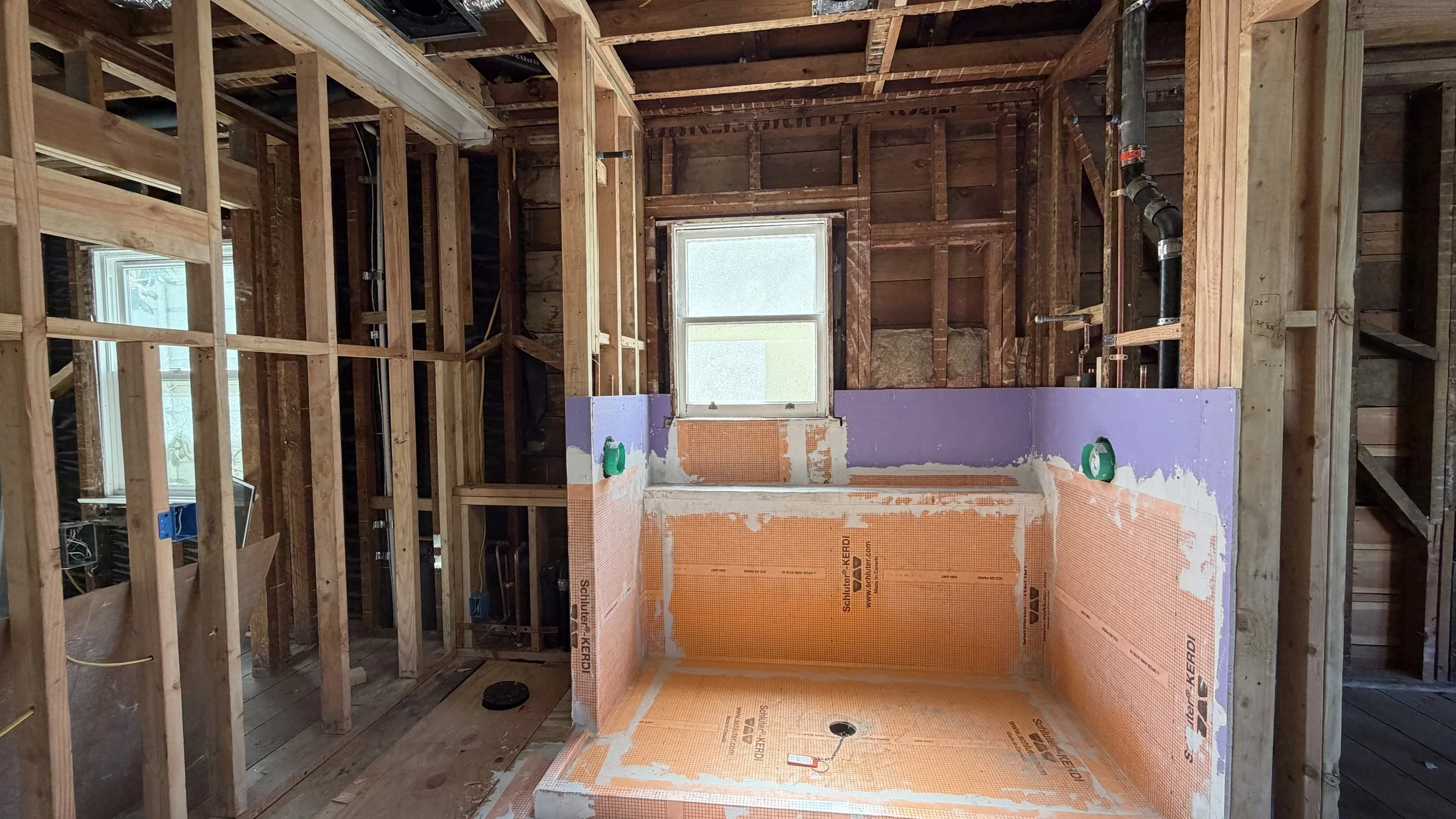 For bathroom remodels, a "shower pan" inspection is required.  Here the shower drain is plugged & the lined shower pan is filled with water.  The pan is required to hold water for a 24-hour period - without a drop in water level or showing any signs 