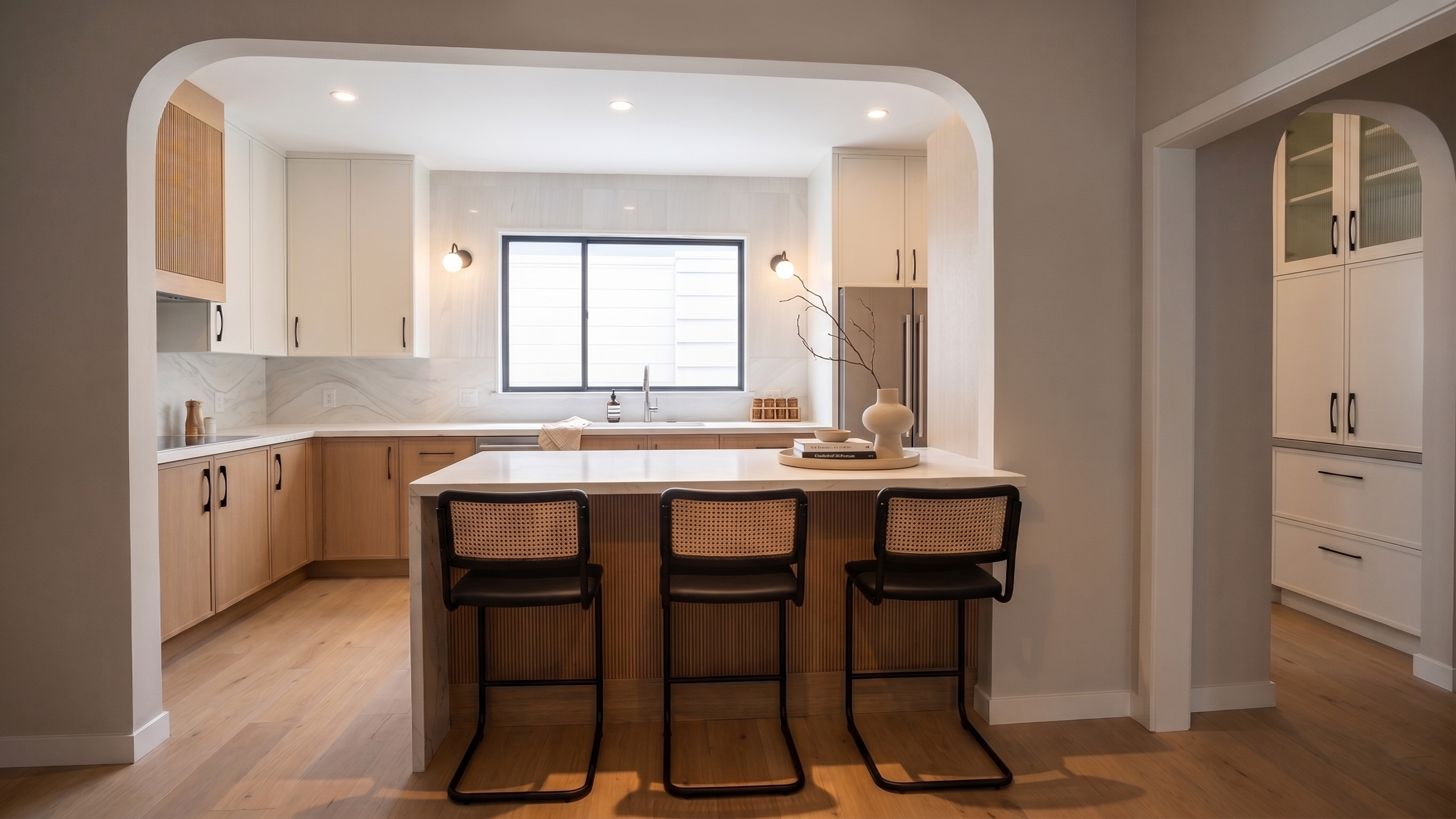 After living in their home for a year following the initial purchase, our homeowners were ready to remodel it to better suit the needs of their family of four. They were eager to say goodbye to their cramped kitchen—complete with a refrigerator tucke