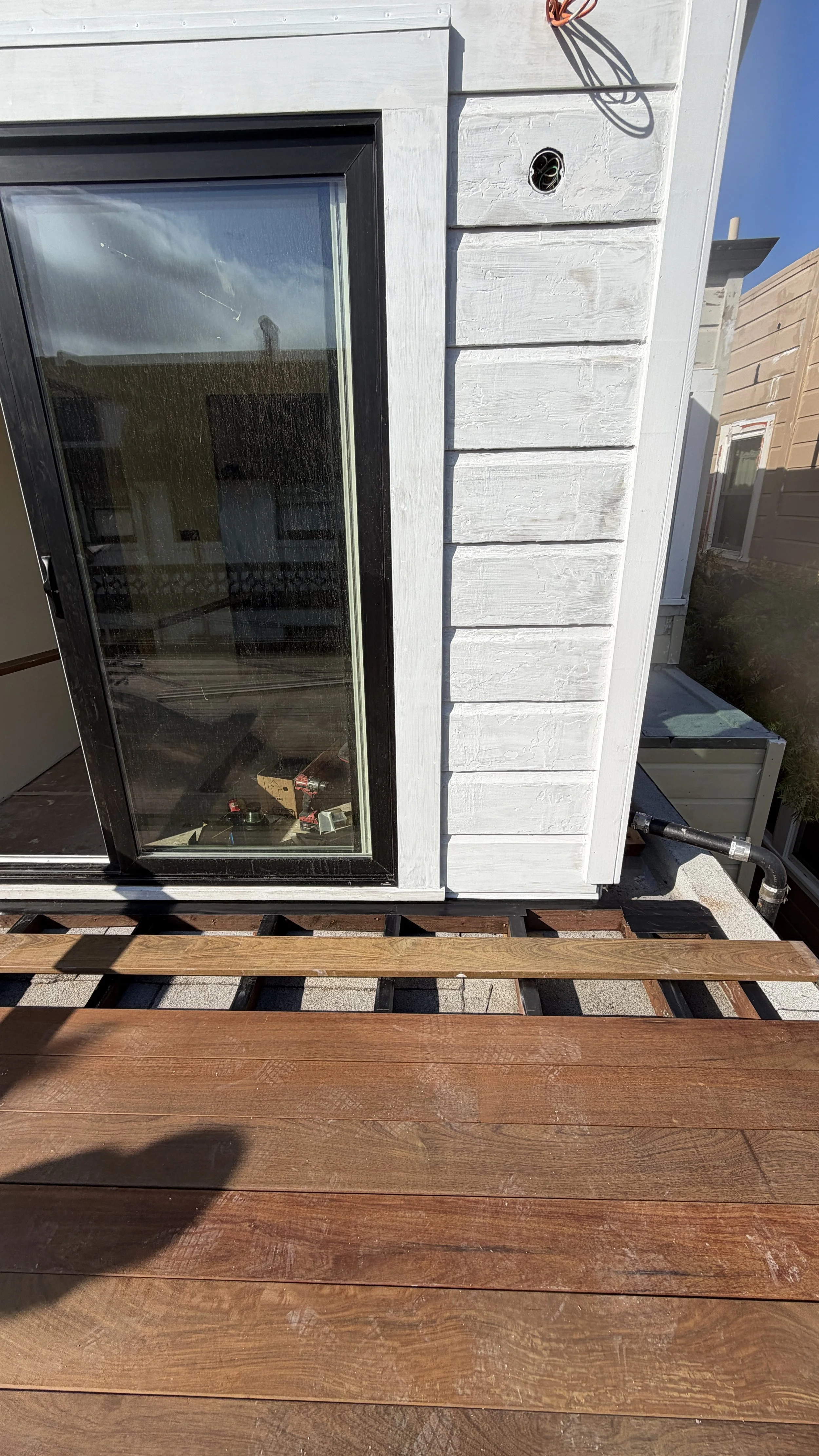 As best practice, we called for the contractor to wrap all of the framing with deck joist tape in order to a create a waterproof barrier that protects the deck’s wood framing from rot and moisture damage.
  
When screws or nails are driven through th
