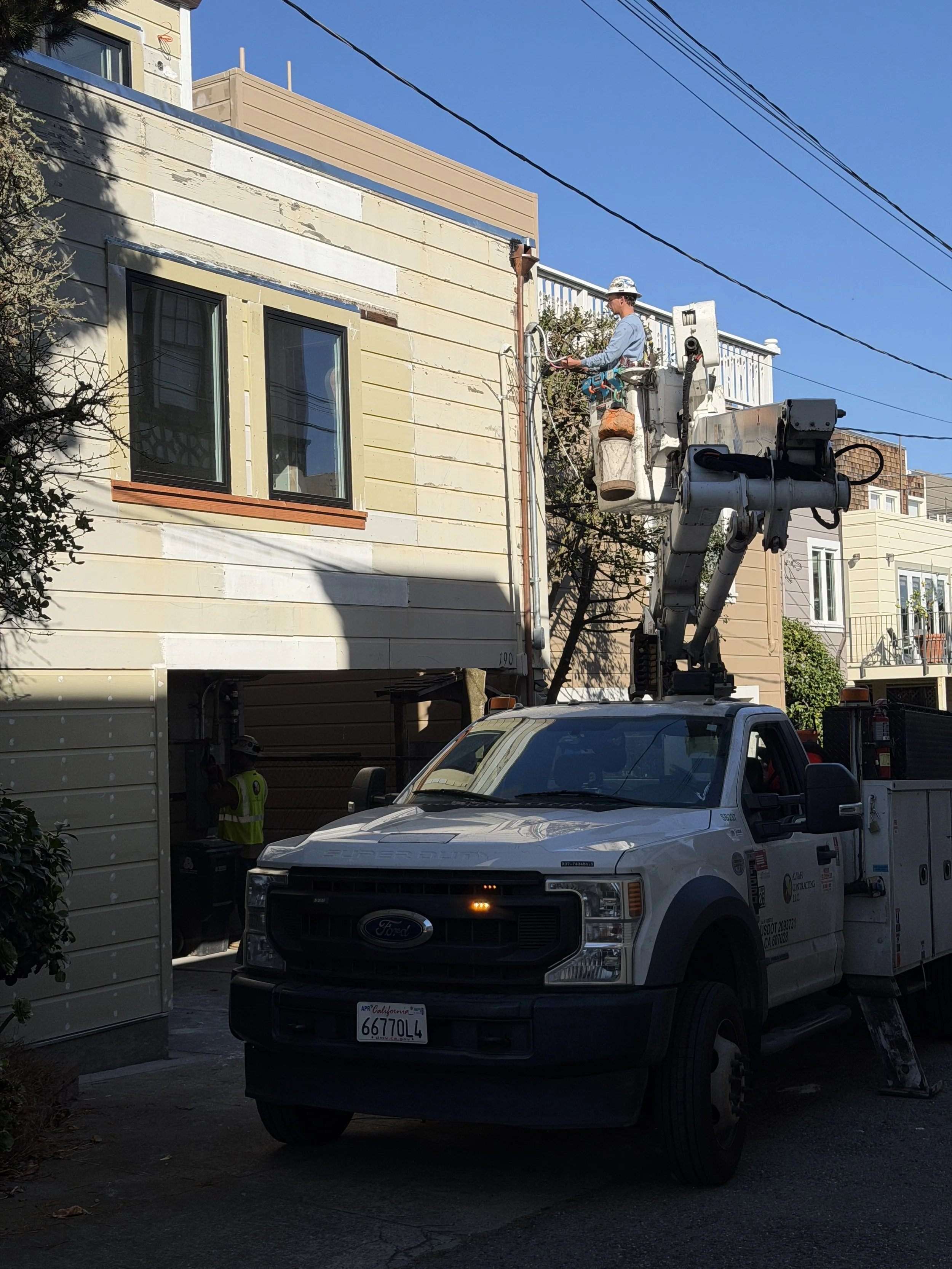PG&E is on site to cut the existing wire & connect the new 200A line.