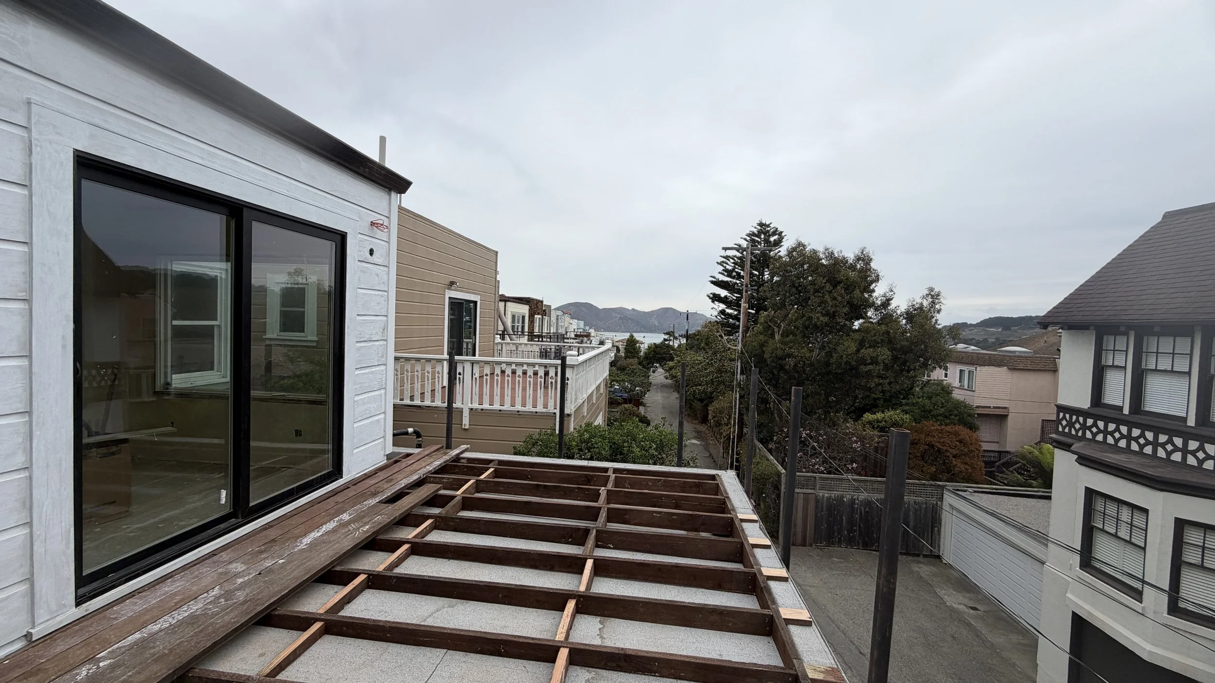 The deck framing & the new steel guardrail posts are now in place. The posts will be removed, taken to be galvanized in a shop in Oakland, & then finally powder coated prior to returning back to the house for installation.