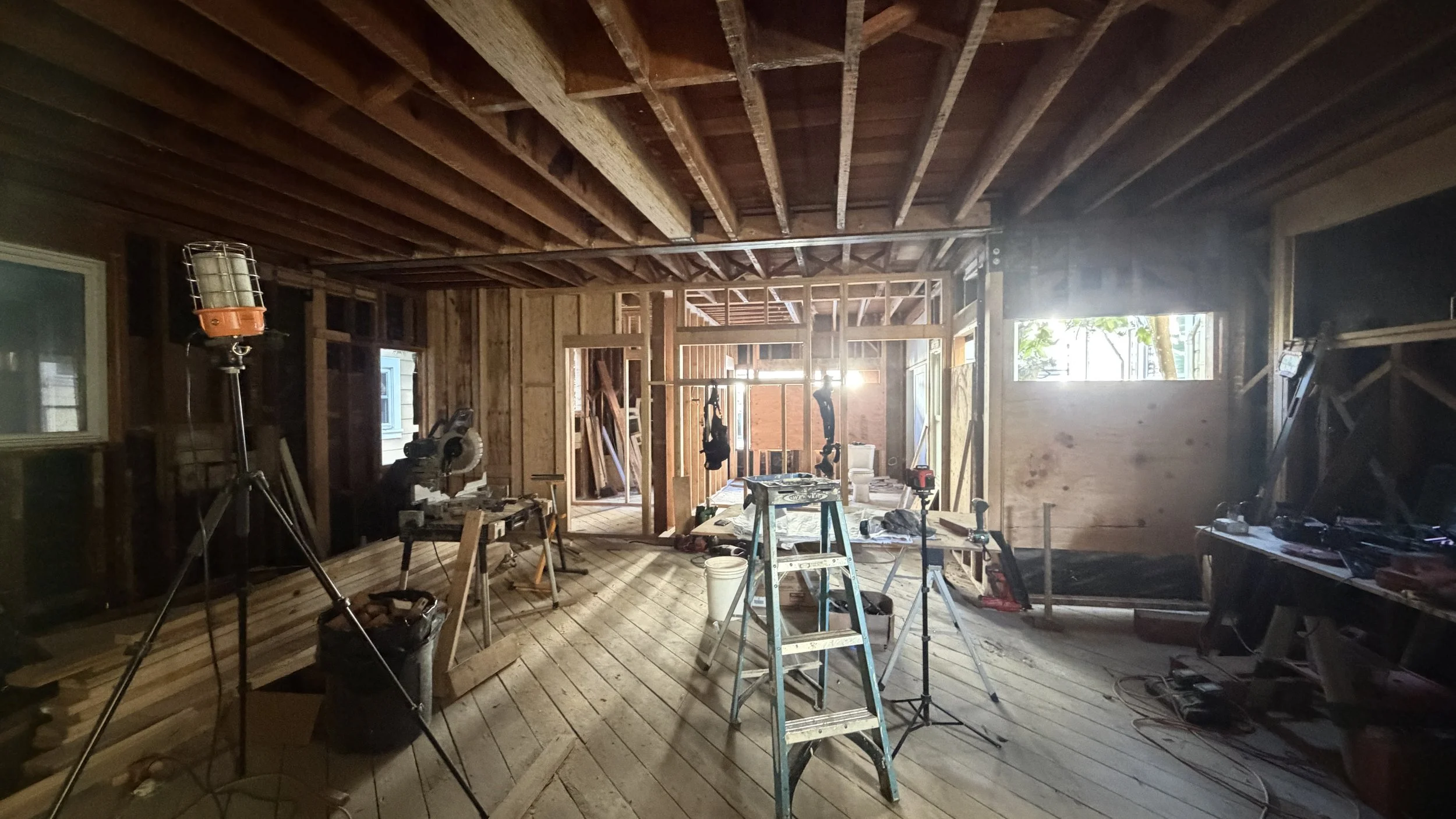 Construction is all about sequencing.  First is rough framing which establishes the wood (and metal) framework of a building.