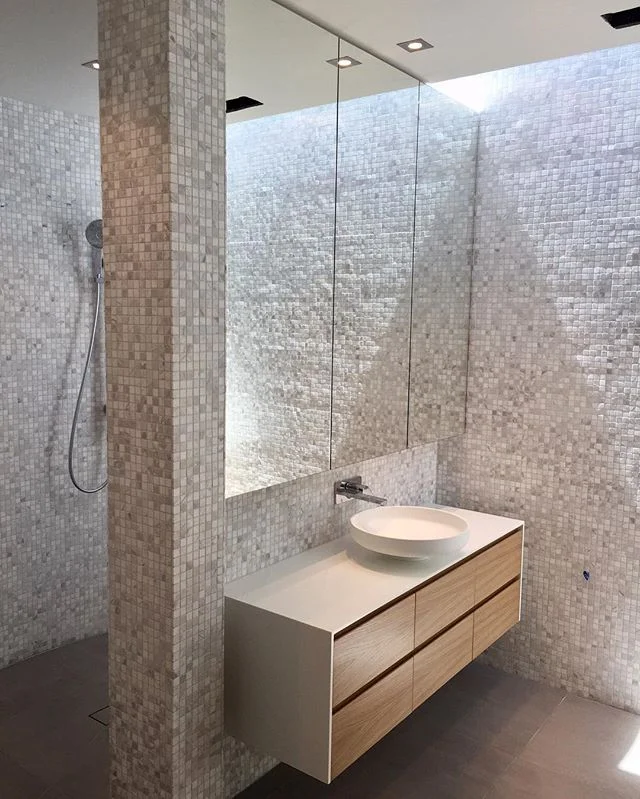 En suite in Caulifield residence by Loop Architecture. Soft light and neutral tones make this space so calming. #bathroomgoals #bathroominspo