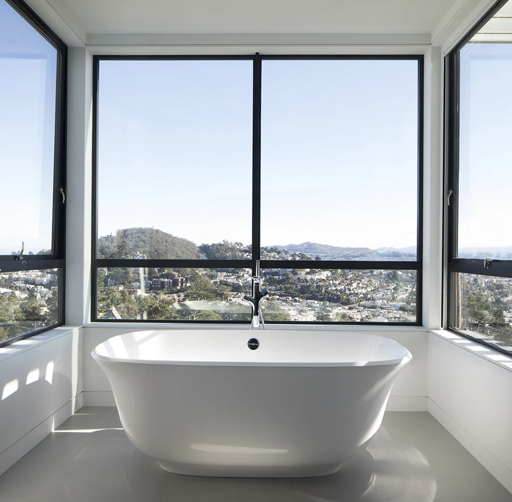 The standalone bathtub is surrounded by views of San Francisco on three sides.