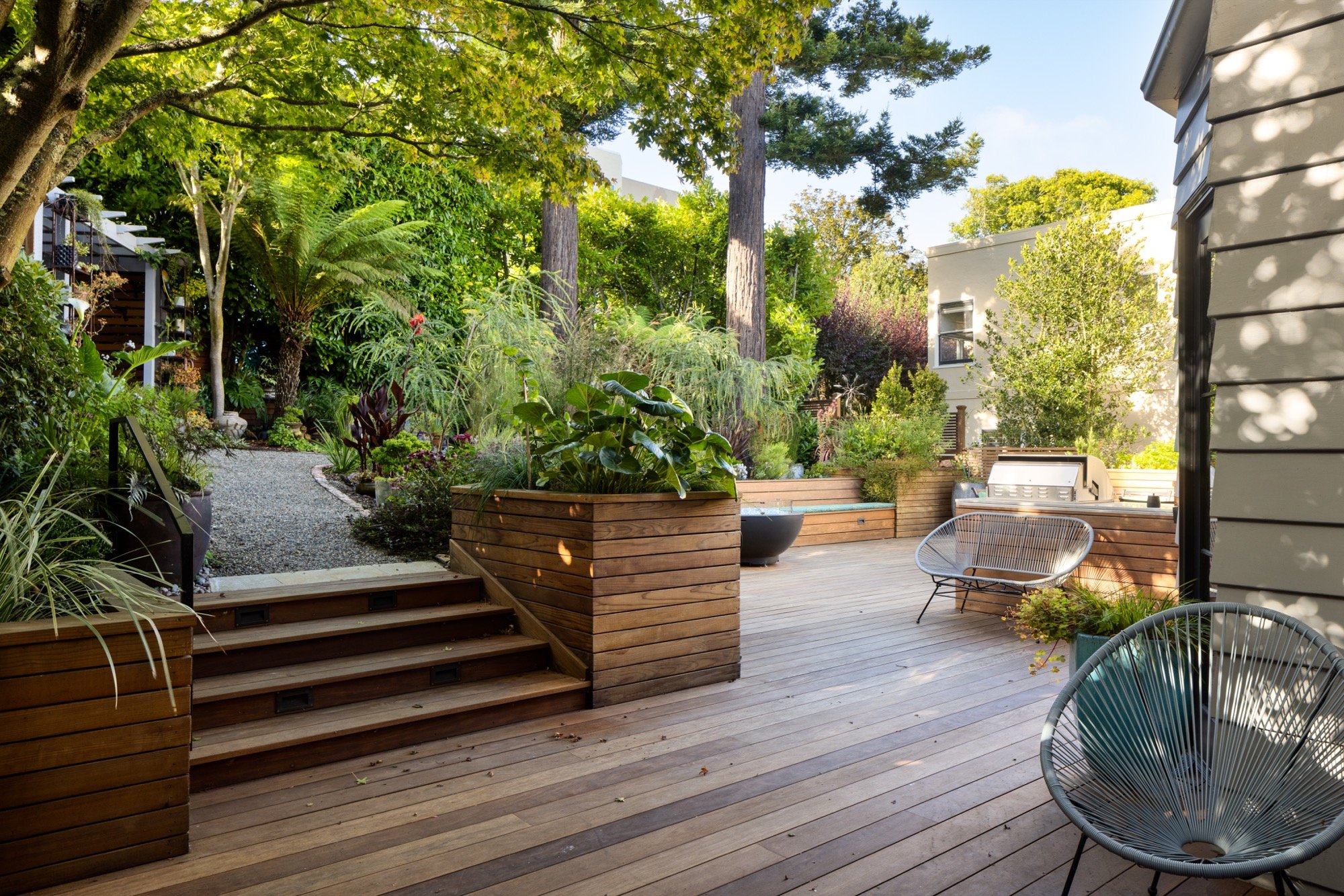 The back patio with wood planters. 