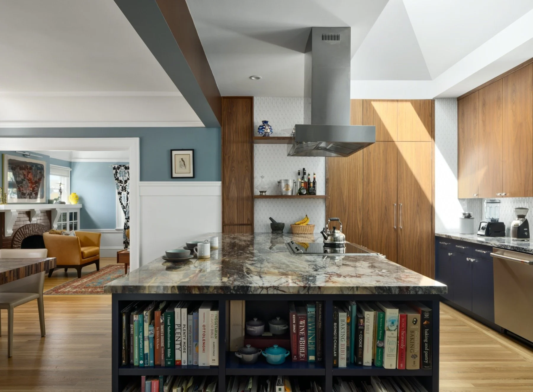  The end of the marble-topped island has cookbook storage. 
