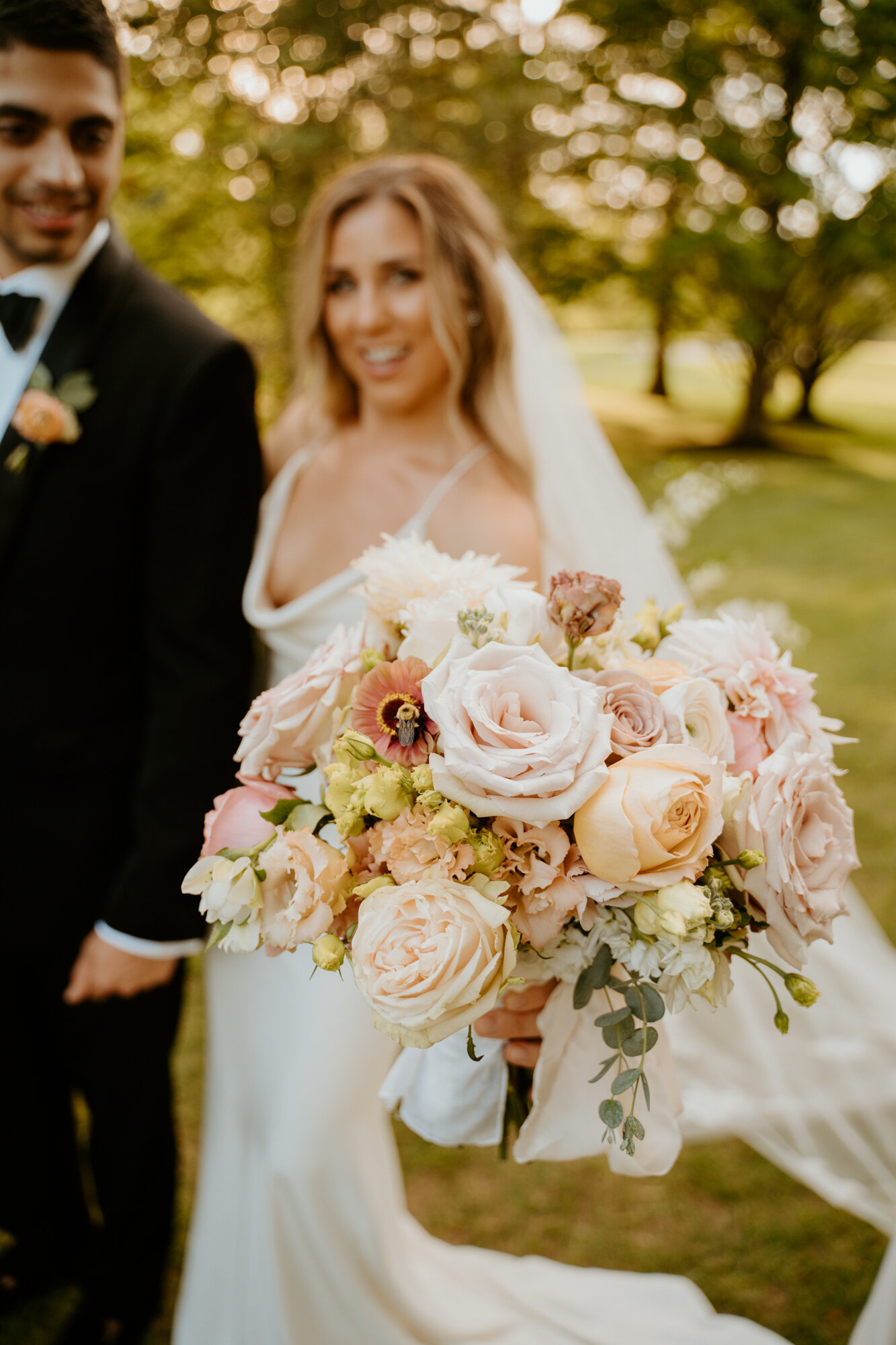 wedding bouquet with a bumble bee