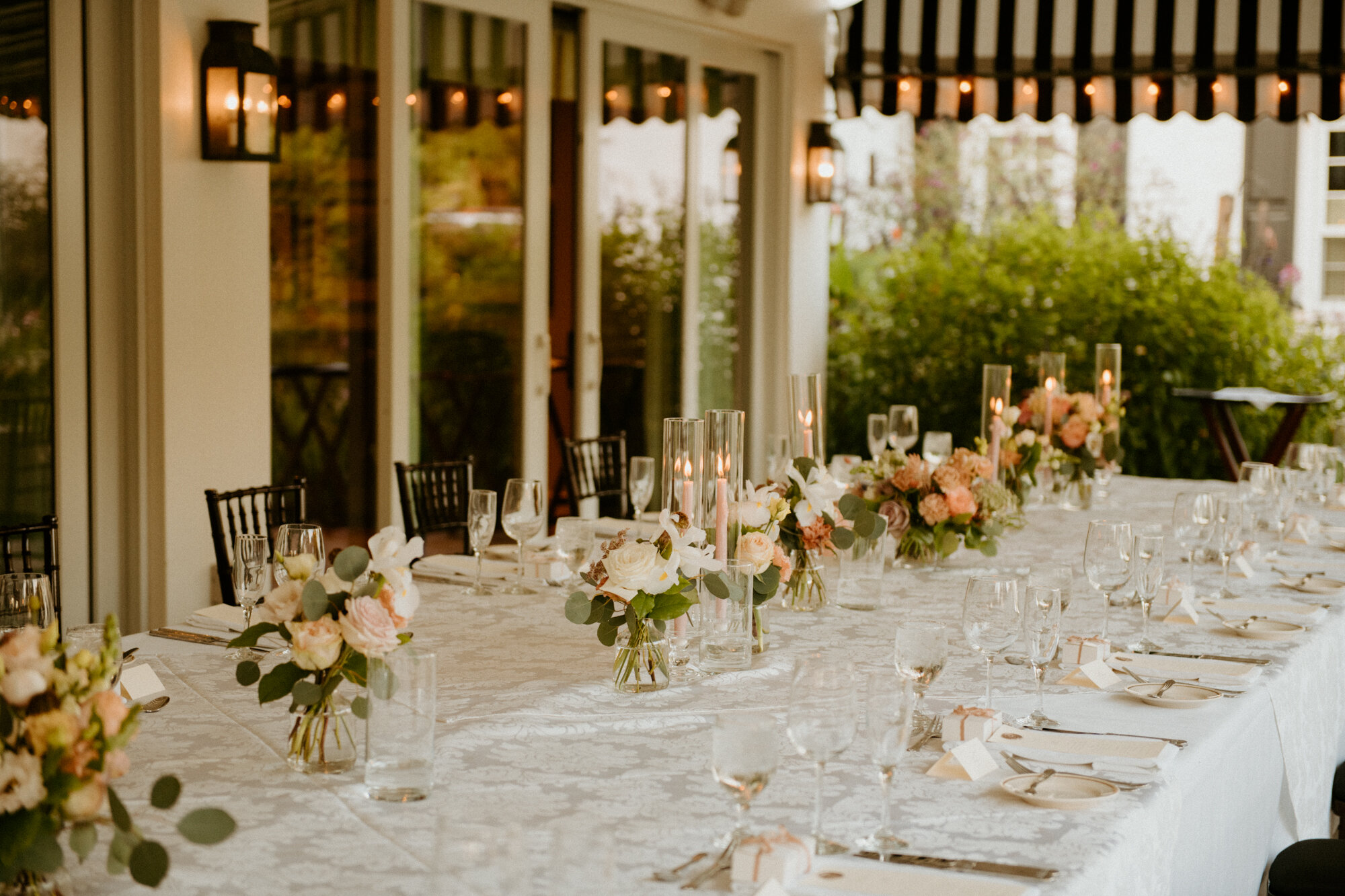 wedding dinner table with flowers and candles