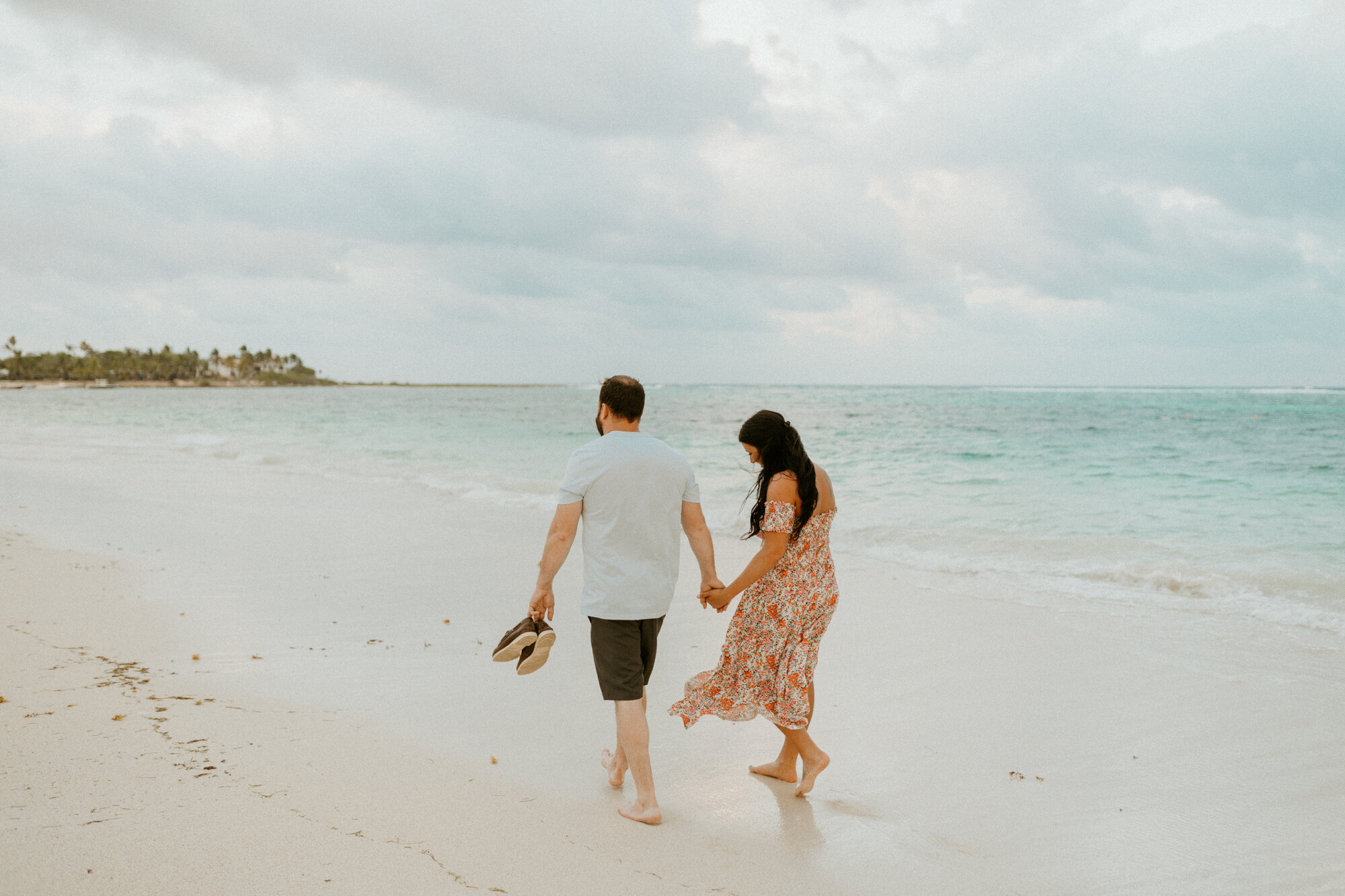 couple on the beach in riviera maya mexico