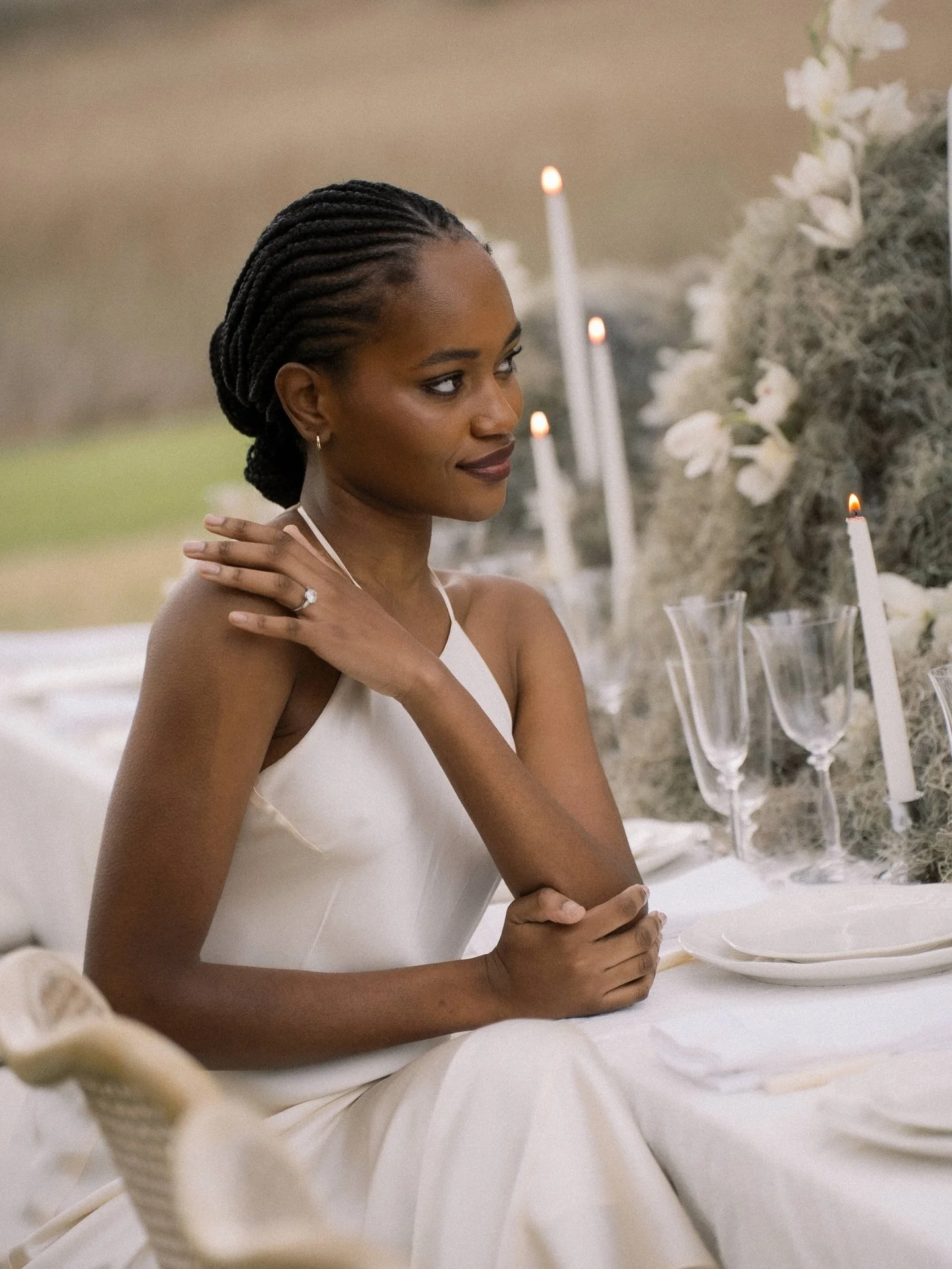 A relaxed and refined low country setting on the Ashley River of Charleston. A place where a story can come to life. Where magic lies in the noticing. The way the wind shifts the marsh grasses and mosses hanging from the oaks, the flicker of the cand