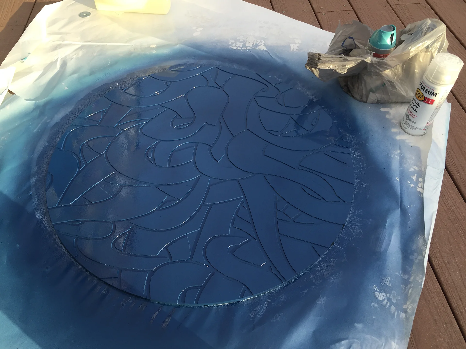 After spraying the second coat of paint on the back side.